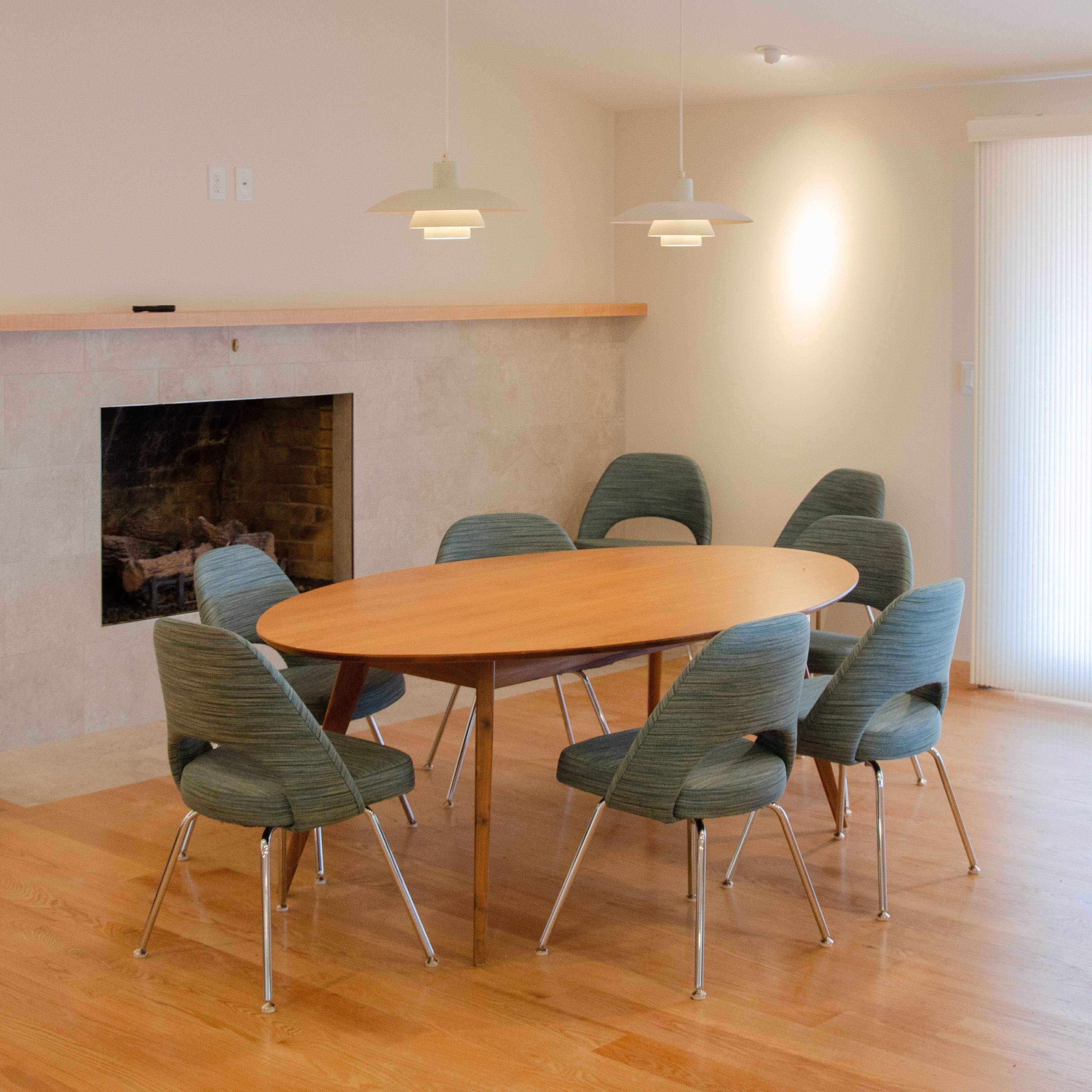 Listed for sale is an original early 2000's custom ordered Jens Risom walnut dining / conference table. The table was produced by Knoll International and is in very nice condition. 
The tables were ordered by Skidmore, Owings & Merrill Architects