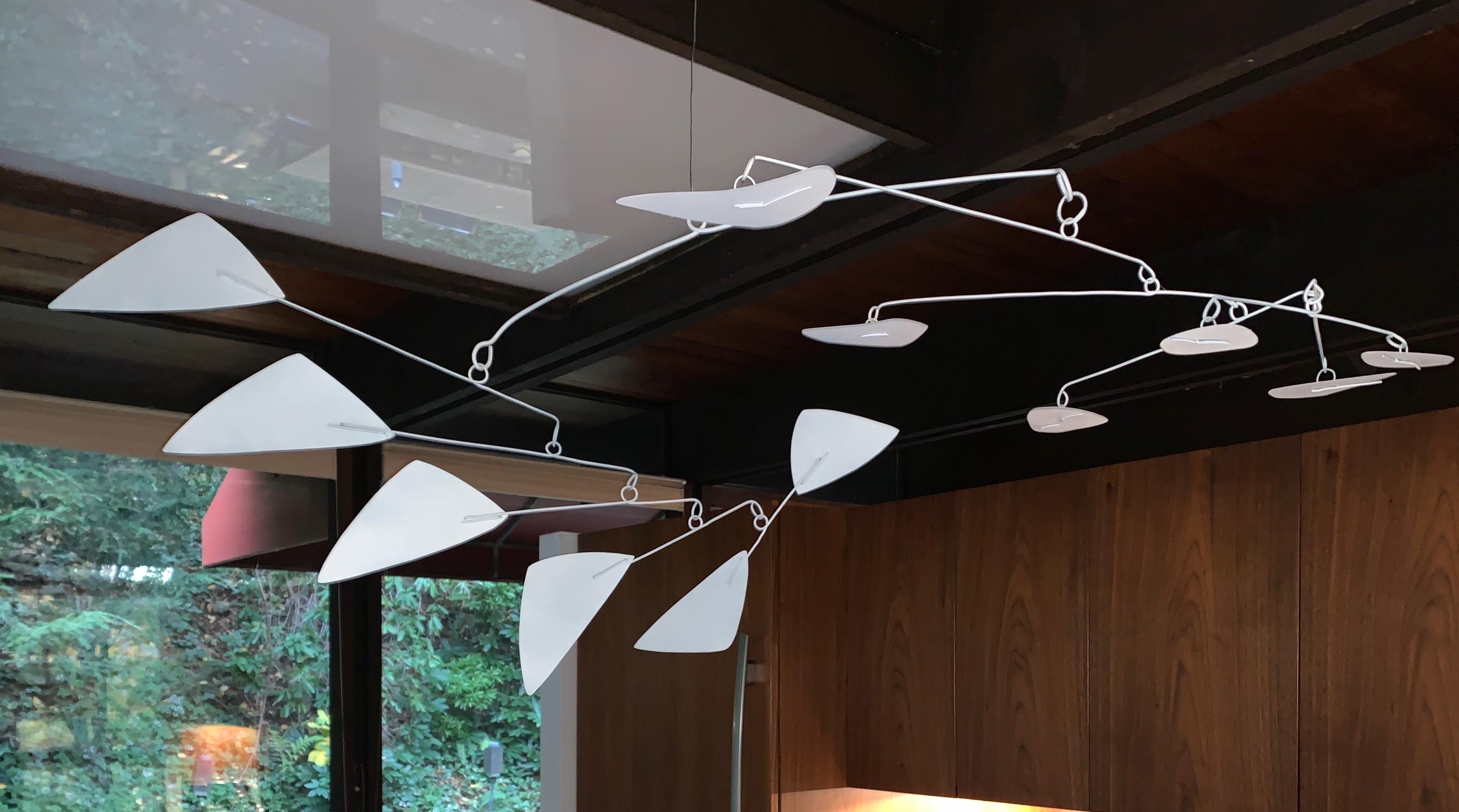 Contemporary New York artist/sculptor Jim Hunter's custom modern hanging white painted metal mobile is a Kinetic sculpture. Different sizes, colors, shapes and custom work available. All works are accompanied with a “Certificate of Authenticity”