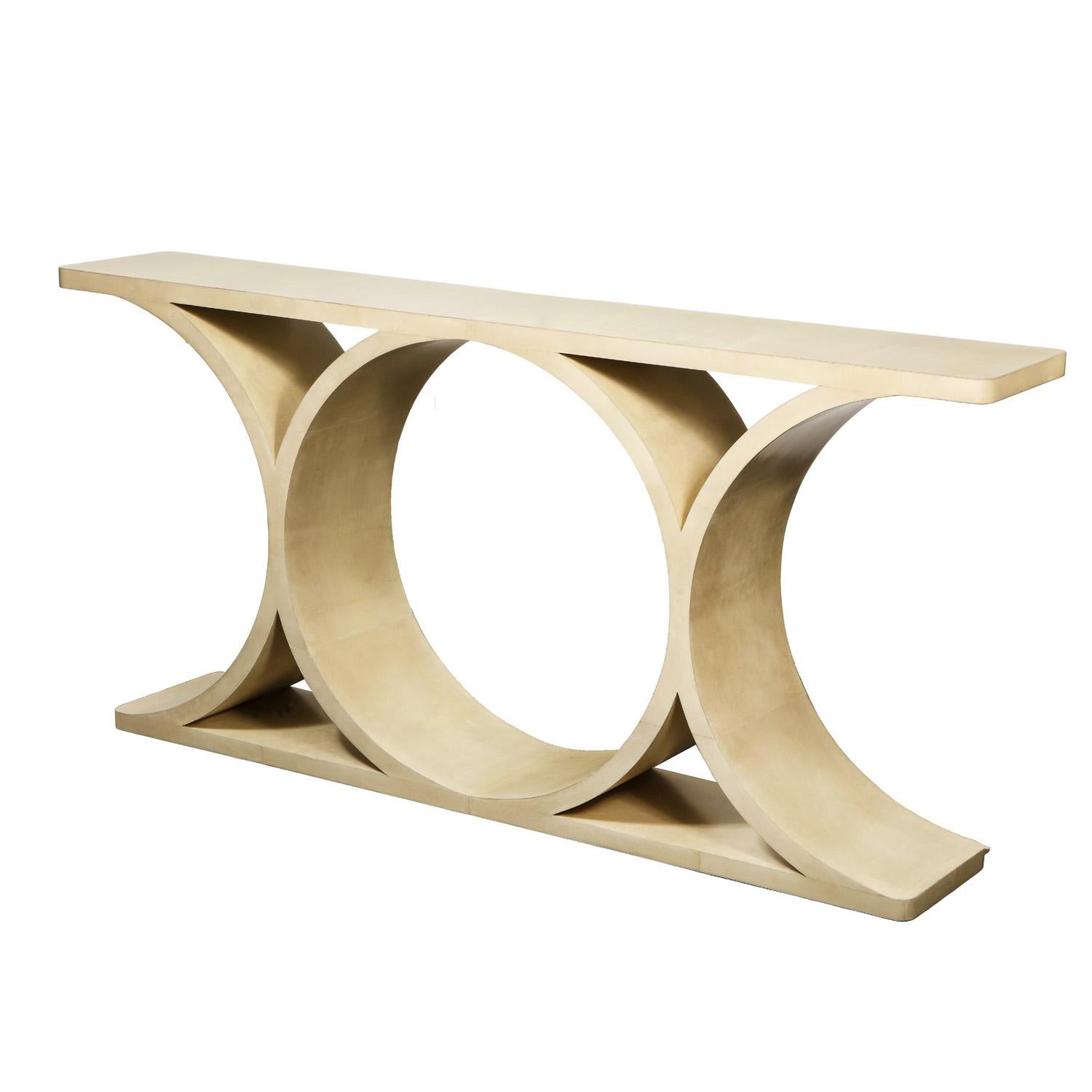 Made to order, custom parchment console in the style of Jean Micheal Frank.
Custom dimensions and finishes are available. Please inquire with Venfield for pricing. Lead time 8-10 weeks.