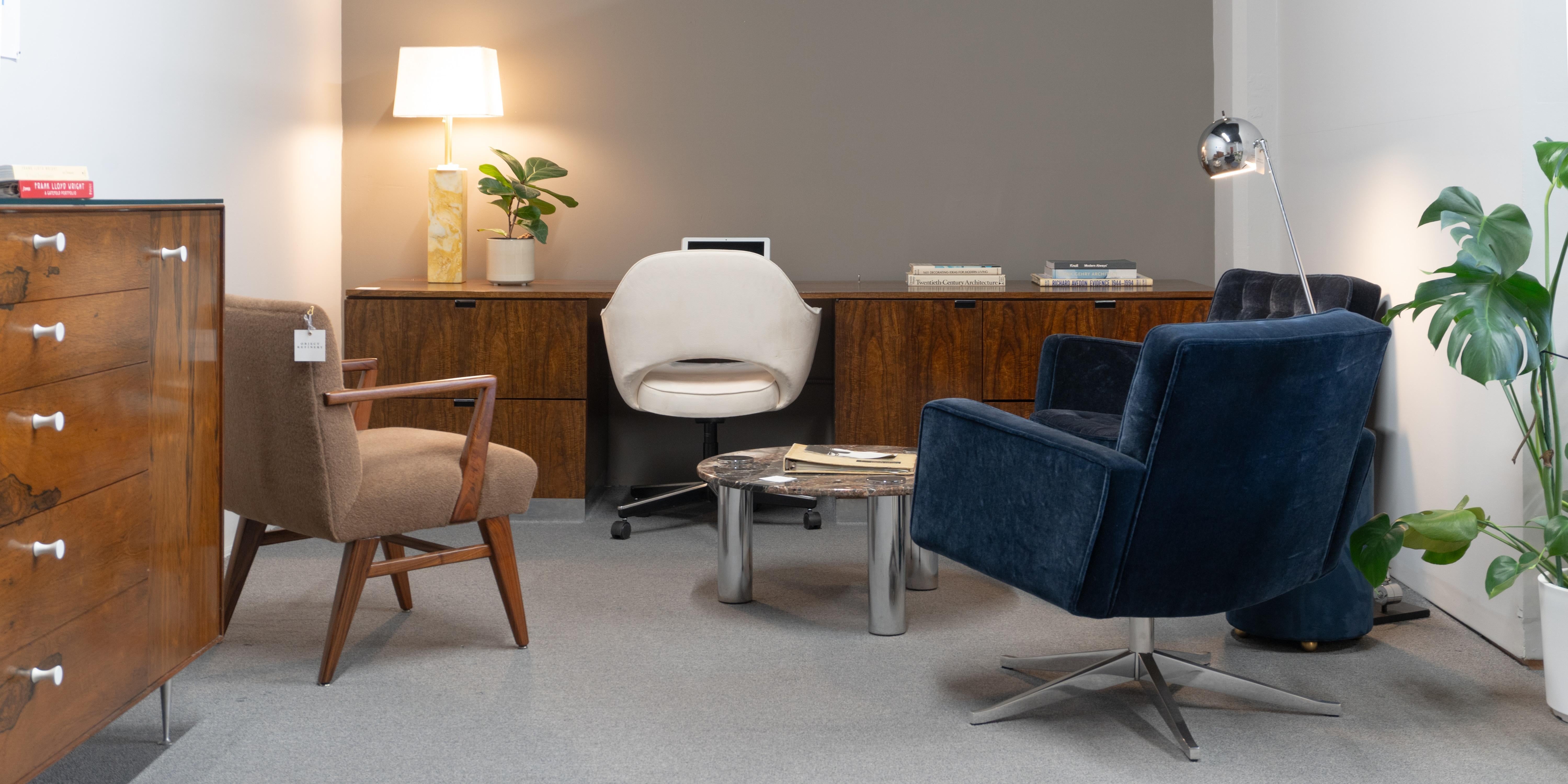 Florence Knoll's transformative influence on Mid-Century design is evident in this elegant custom-designed Executive Credenza Desk. As a pioneer in interior design, Knoll founded the renowned 