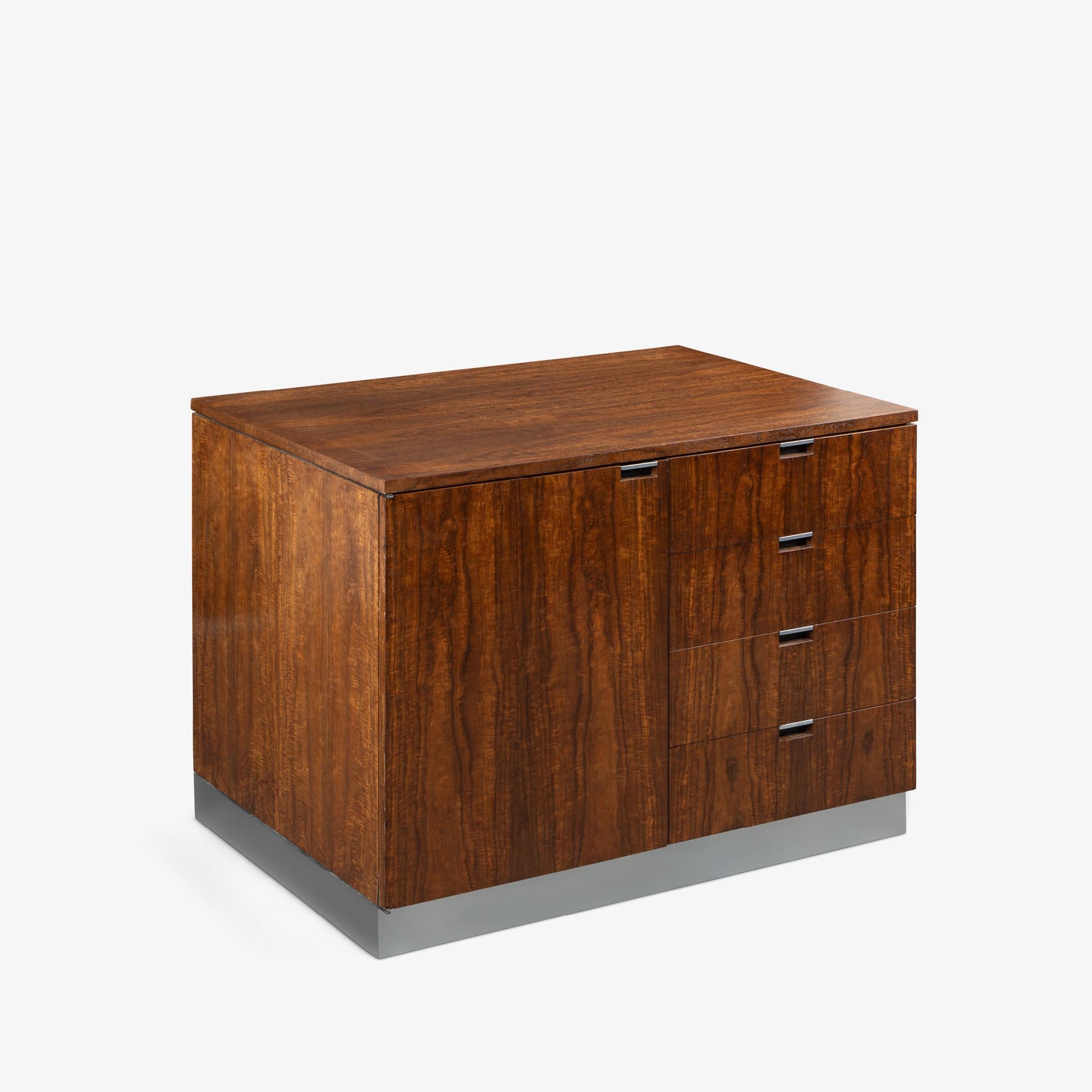 Florence Knoll's transformative influence on Mid-Century design is evident in this elegant custom-designed Executive Cabinet. As a pioneer in interior design, Knoll founded the renowned 