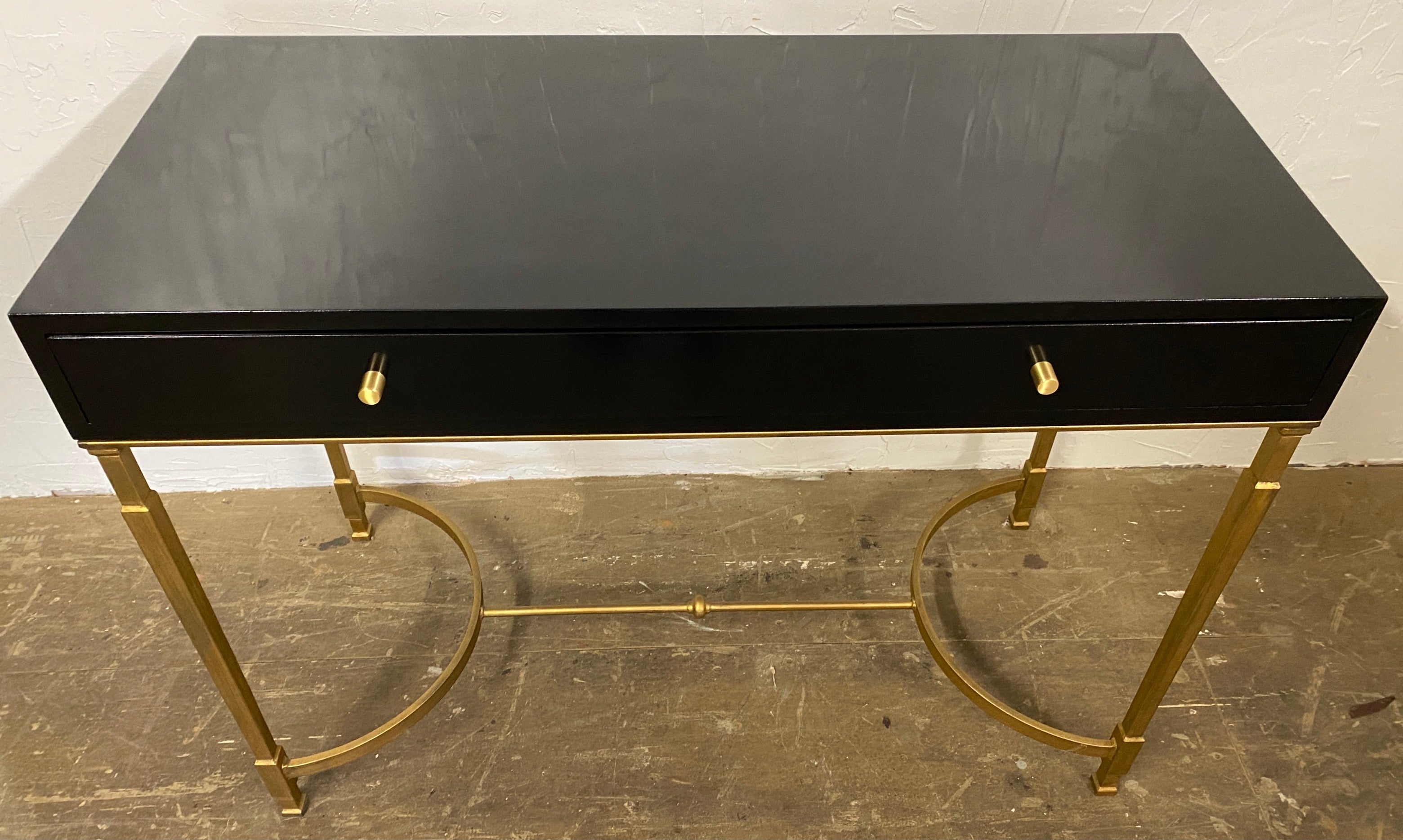 Custom made by us to suit your special need. This is a great piece for a desk, a vanity, entry hallway table, night table, end table or side table. This particular one is available. 
We can paint in different colors, different metal finish and of