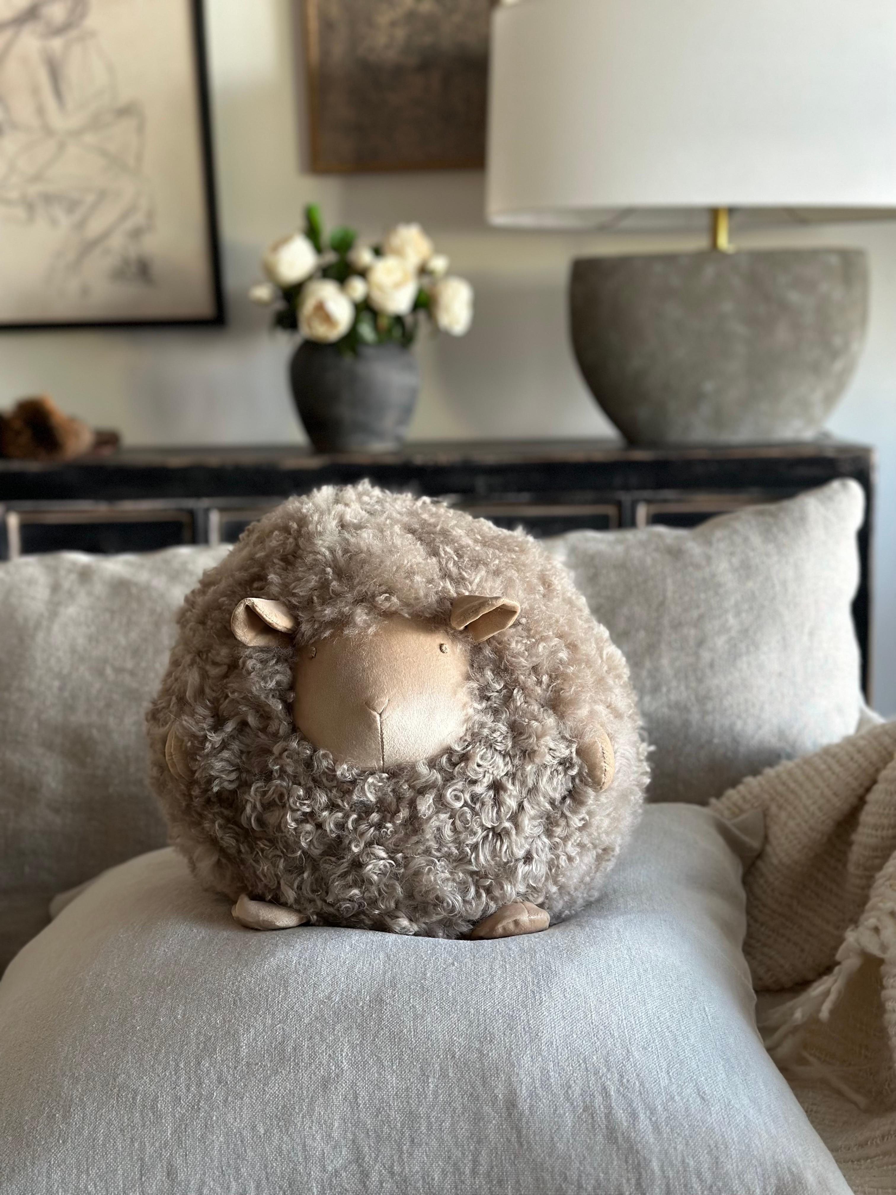 Custom Sherpa Lambs Wool Pillow
Round with cute embroidered face, feet and tail.
12