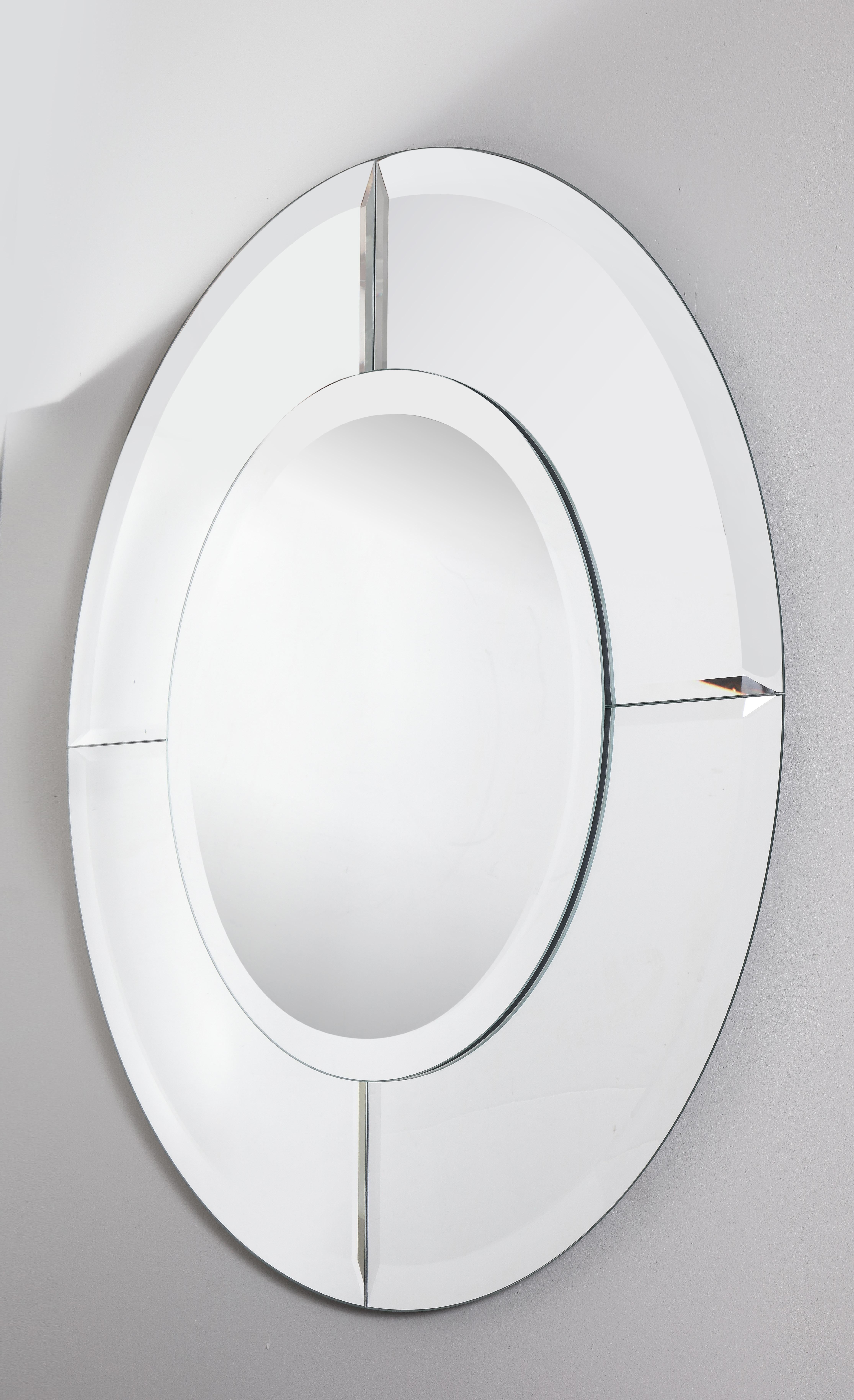 Custom round mirror with clear glass border in the manner of Karl Springer. Custom orders are available for different sizes and glass colors.