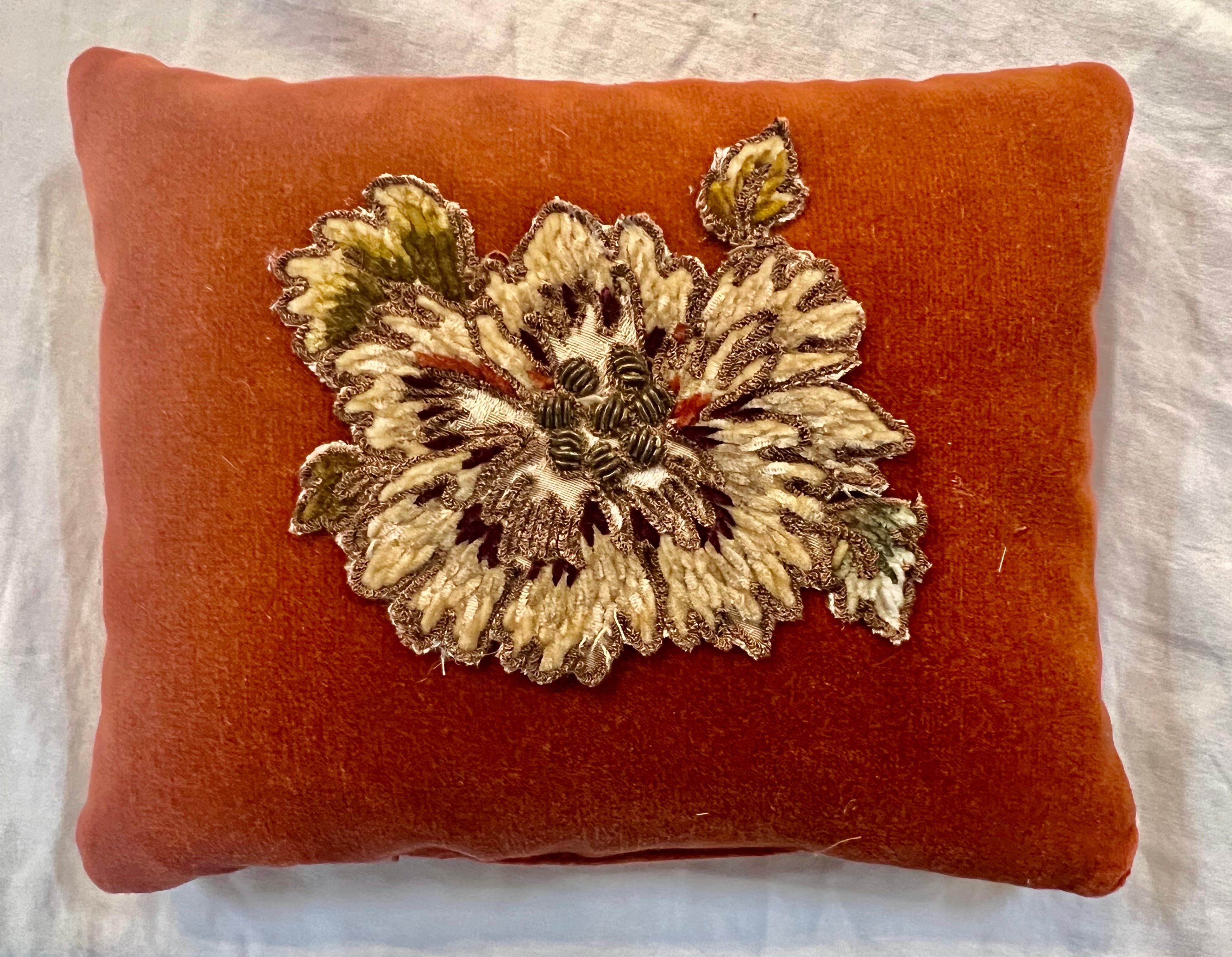 A beautifully crafted lavender sachet with intricate details.  The burnt orange velvet paired with a 19th-century French metallic & chenille flower creates a unique and elegant piece.