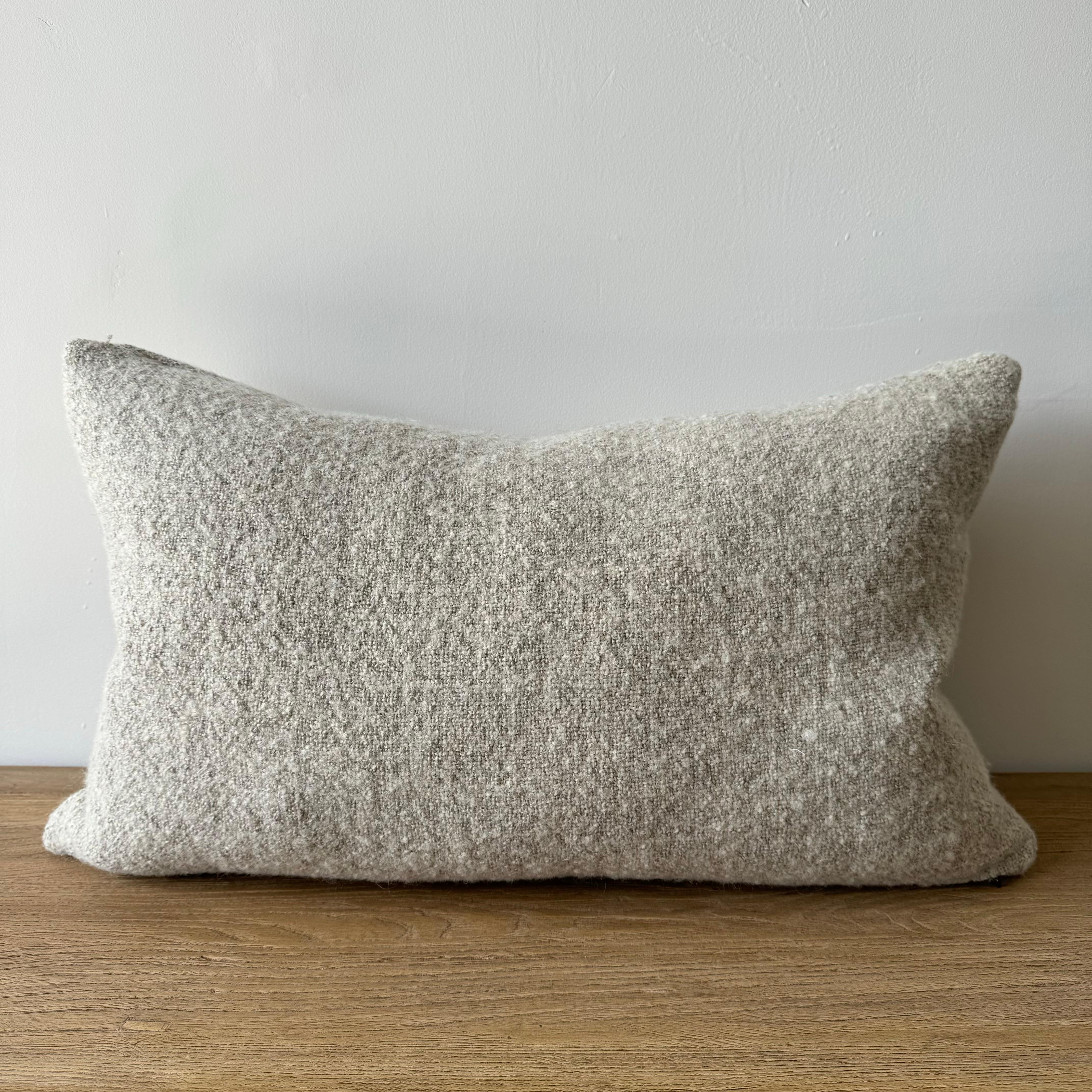 A soft natural flax oatmeal and beige woven fibers in a stonewash finish create this luxurious soft pillow. Sewn with an antique brass zipper closure and overlocked edges.
Includes a down/ feather insert.
Size: 15