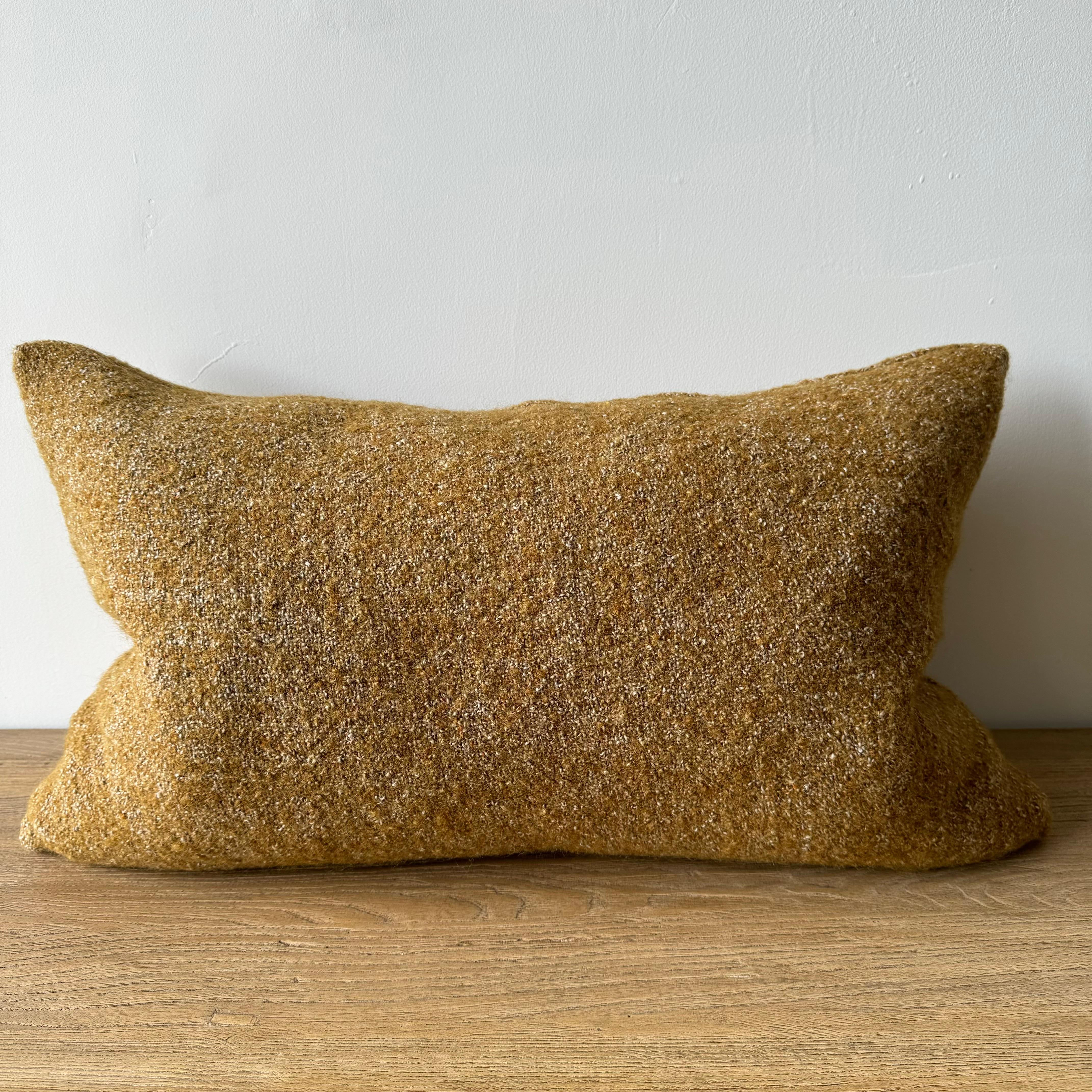 A rich rusty terracotta and natural flax oatmeal woven fibers in a stonewash finish create this luxurious soft pillow. Sewn with an antique brass zipper closure and overlocked edges.
Includes a down/ feather insert.
Size: 15