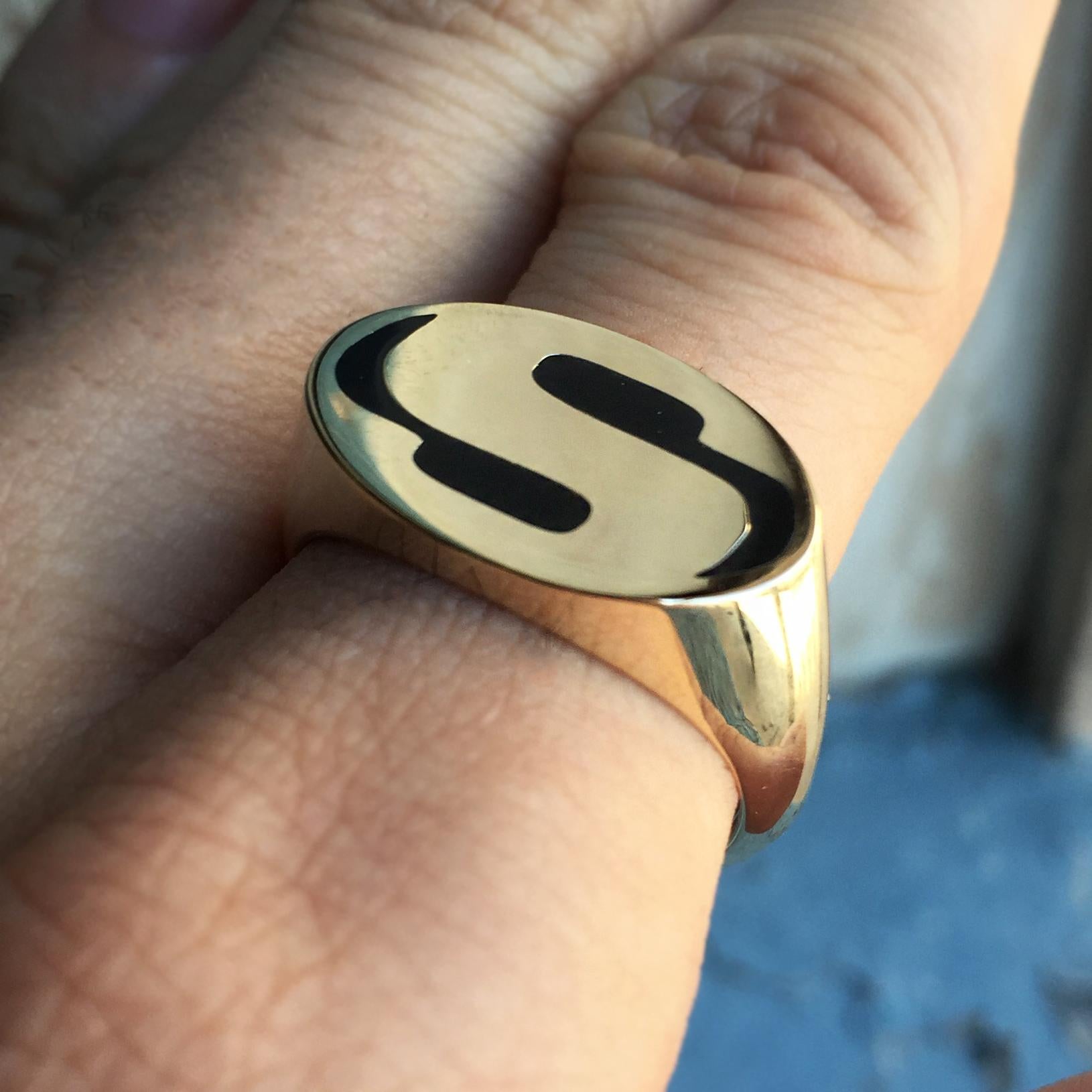 Ring Details:

Custom Made 10k Yellow Gold Mens Logo Ring, This will be made from scratch and take approximately 2-4 Business Weeks.

The ring in the picture has black enamel around the Logo.

Send me your company logo, initials , ect...

Any finger