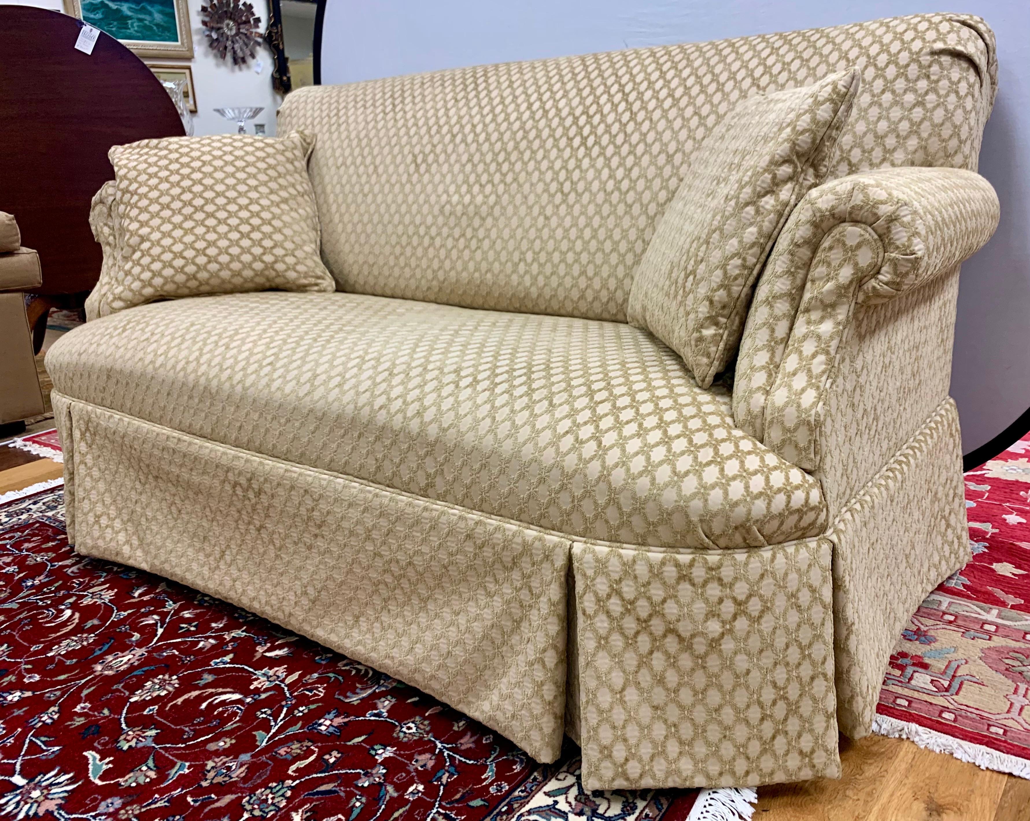 Stunning custom loveseat that measures six feet wide and has a luxurious Kravet fabric
featuring a regal raised trellis pattern. The second of two matching loveseats. All dimensions are below. Now, more than ever, home is where the heart is.