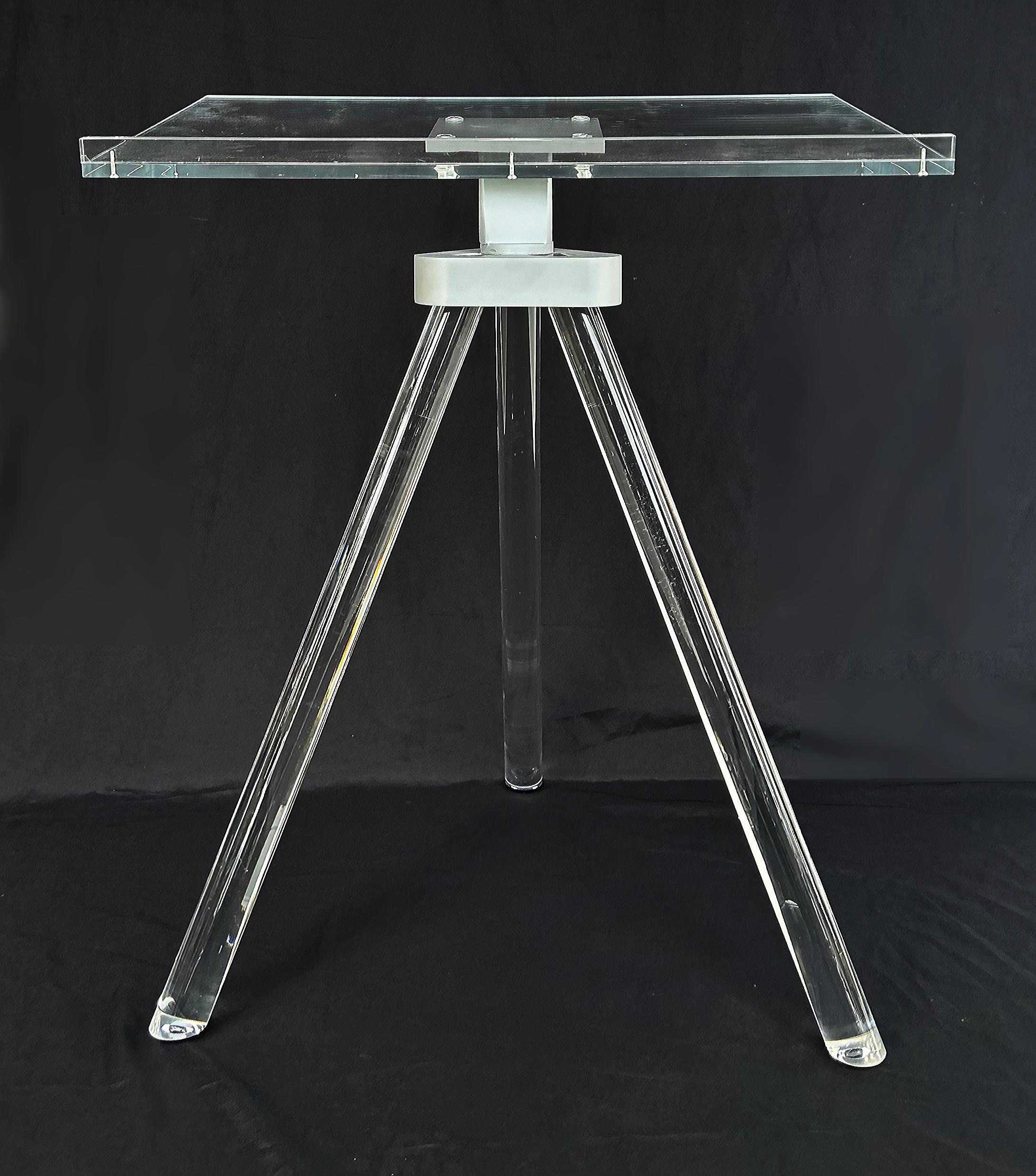 Custom Lucite, Cast Acrylic Tripod Book Stand for Taschen Style Oversized Books

Offered for sale is a Lucite and cast acrylic three-legged Taschen style book stand for over-sized books.  This is a new design inspired by Taschen.  This book stand