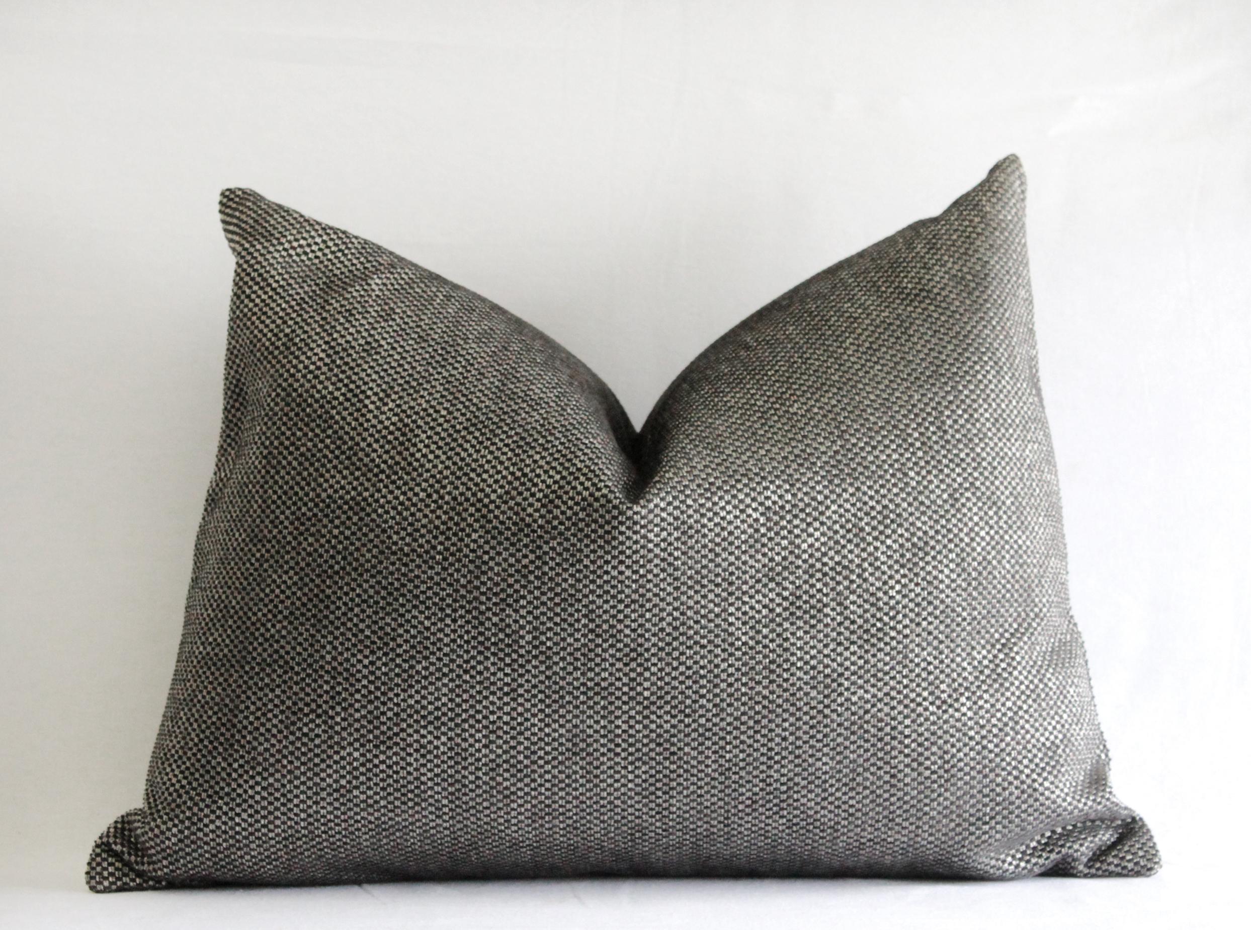 Price is for each pillow. Includes down/feather insert
Custom made from a beautiful woven fabric, has a sleek modern feel.
Made with a knife edge, and overlocked with a zipper closure.
Measures: 17