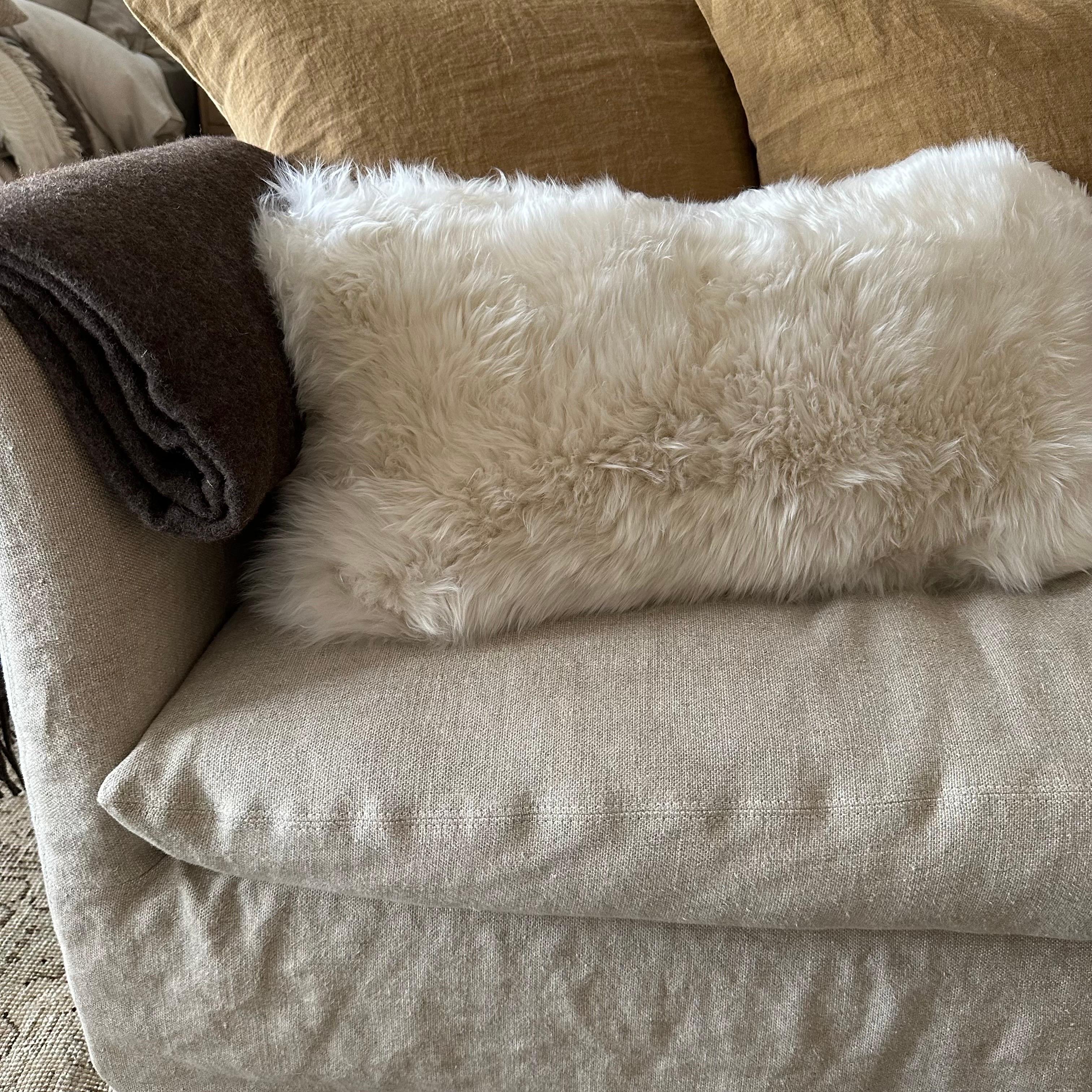 Our sheepskin cushions are made of 100 % sheepskin and are very fashionable. The cushion has an oblong shape which makes it a perfect shape for the couch or the bed. The cushion is made of long wool which gives an extra cozy feel in your
