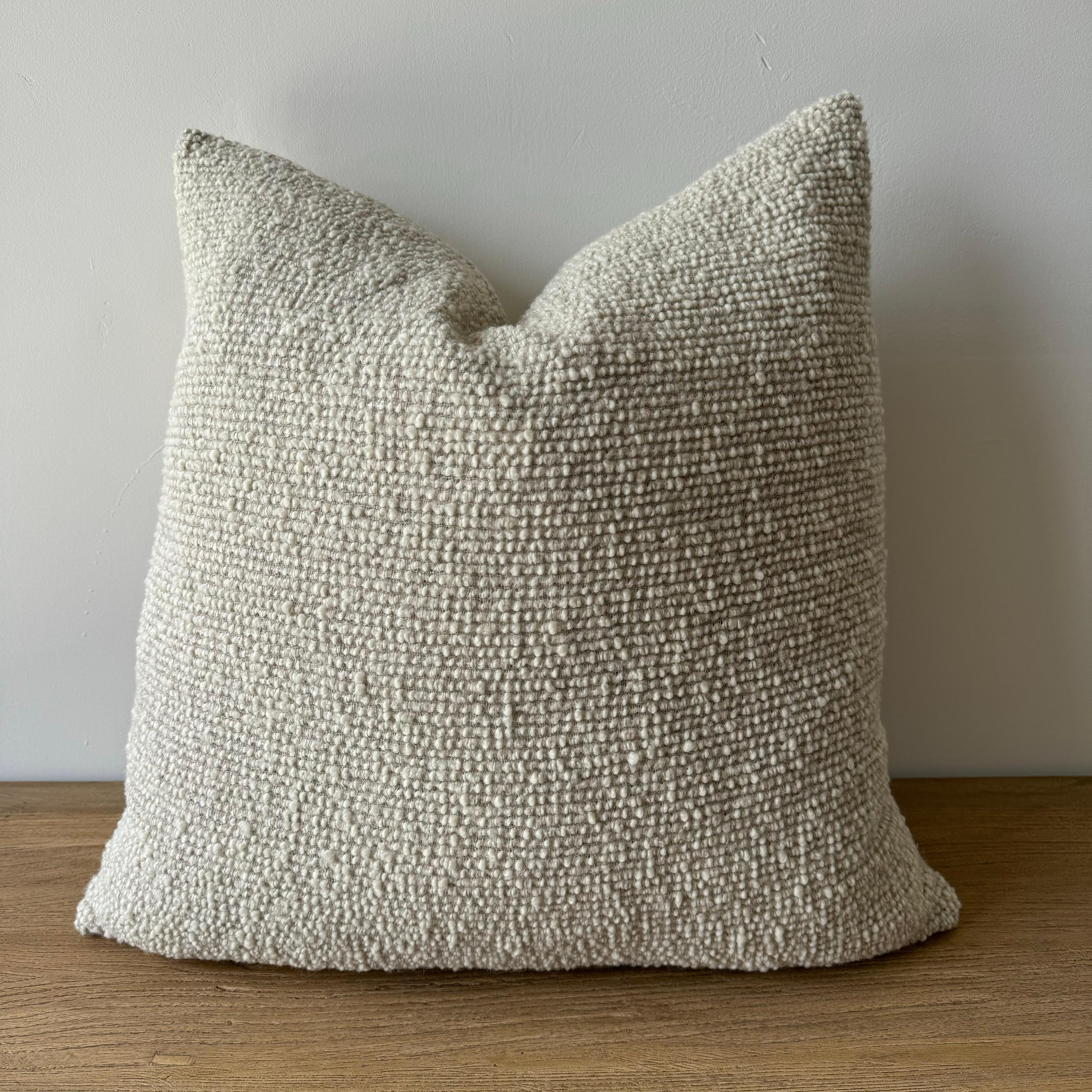 Oatmeal and natural flax wool and linen woven fibers in a stonewash finish create this luxurious soft pillow. Sewn with an antique brass zipper closure and overlocked edges.
Includes Down/Feather Insert
Size: 22 x 22. (custom sizes available)
-20%