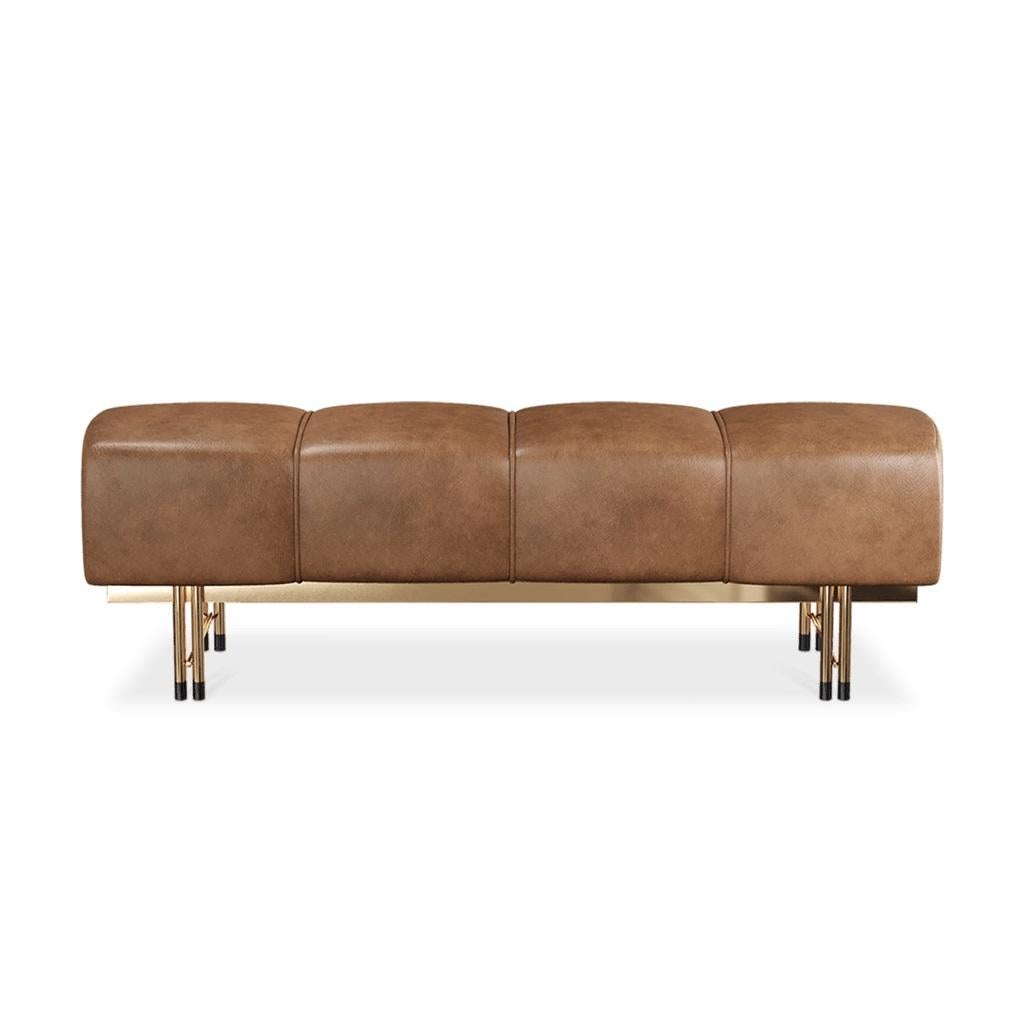 This bench exudes modern sophistication with its plush upholstered seat and sleek metal base. The generously cushioned seat, covered in rich fabric, offers exceptional comfort and a touch of luxury. Its segmented design adds a sculptural element,