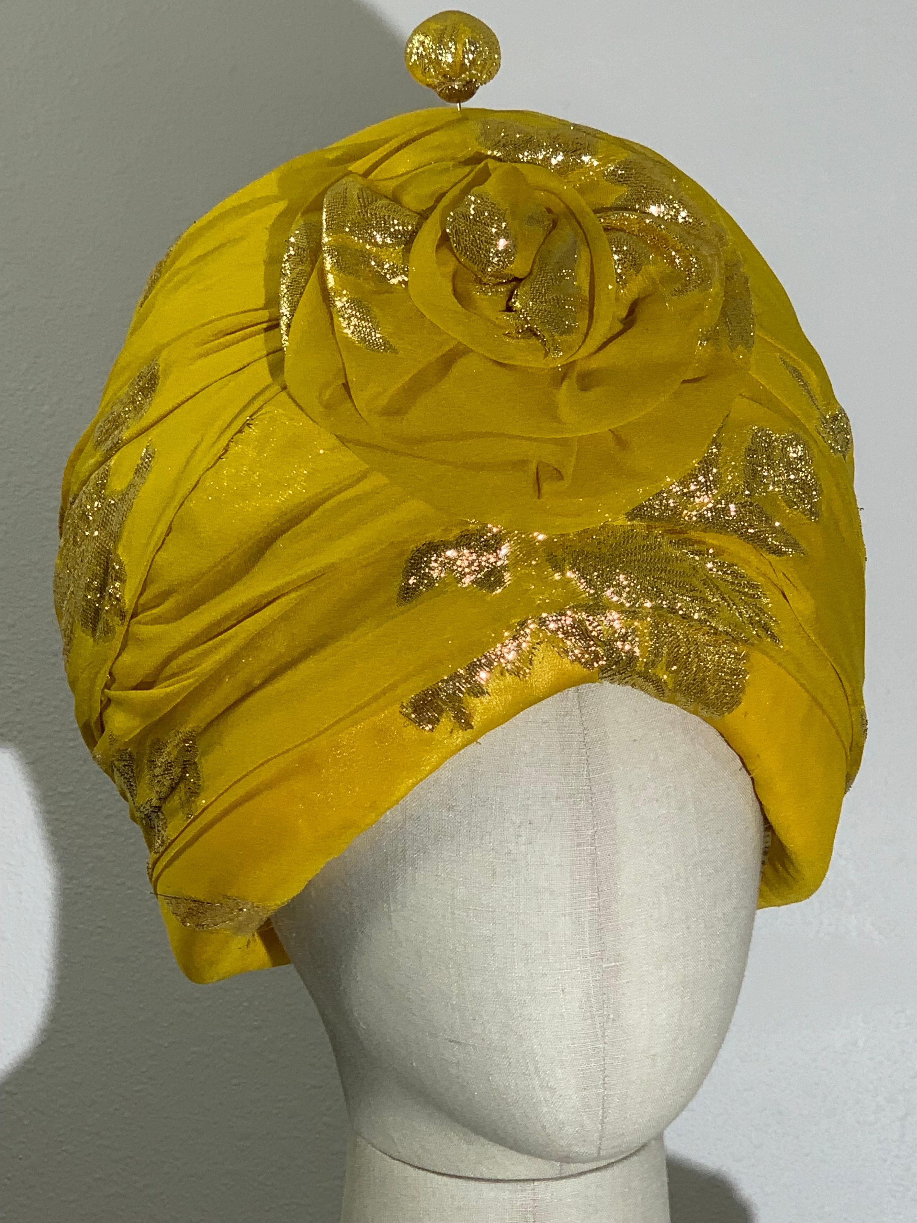 Custom Made Suzanne Couture Millinery Canary Yellow Silk Chiffon Lame Floral Patterned Tufted and Padded Turban w Flower and Coordinating Large Hatpin.  Lined in yellow satin. Inner combs for securing.  US size 6 3/8.

Please visit our 1Dibs Store