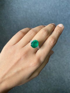 Custom Made Certified 4.4 Carat Emerald and Diamond Three Stone Engagement Ring