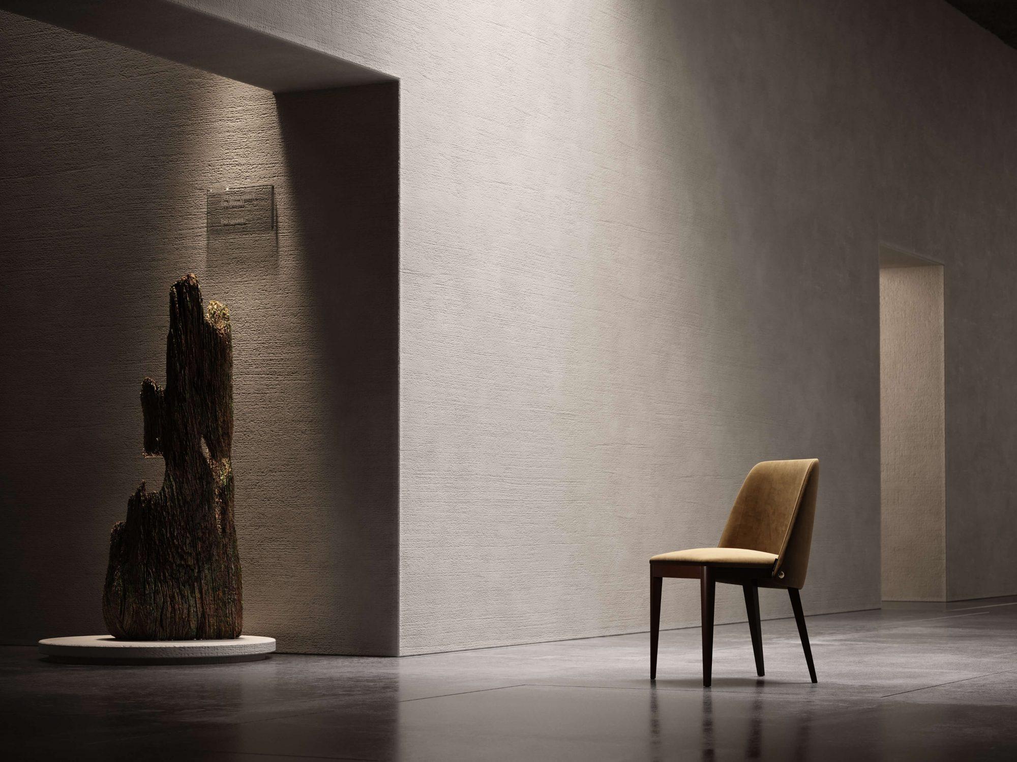 Skulpturales Design, inspiriert von der Arbeit des niederländischen Architekten Rem Koolhaas. 
Standardausführungen
Stoffe: Strukturierter Bouclé 
Struktur: Graphit-Esche
Metall-Bolzen: Gold.
