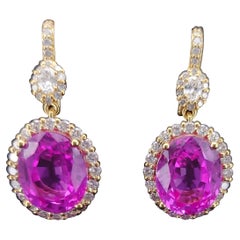 Orecchini su misura con zaffiro rosa e diamanti in oro giallo 14k