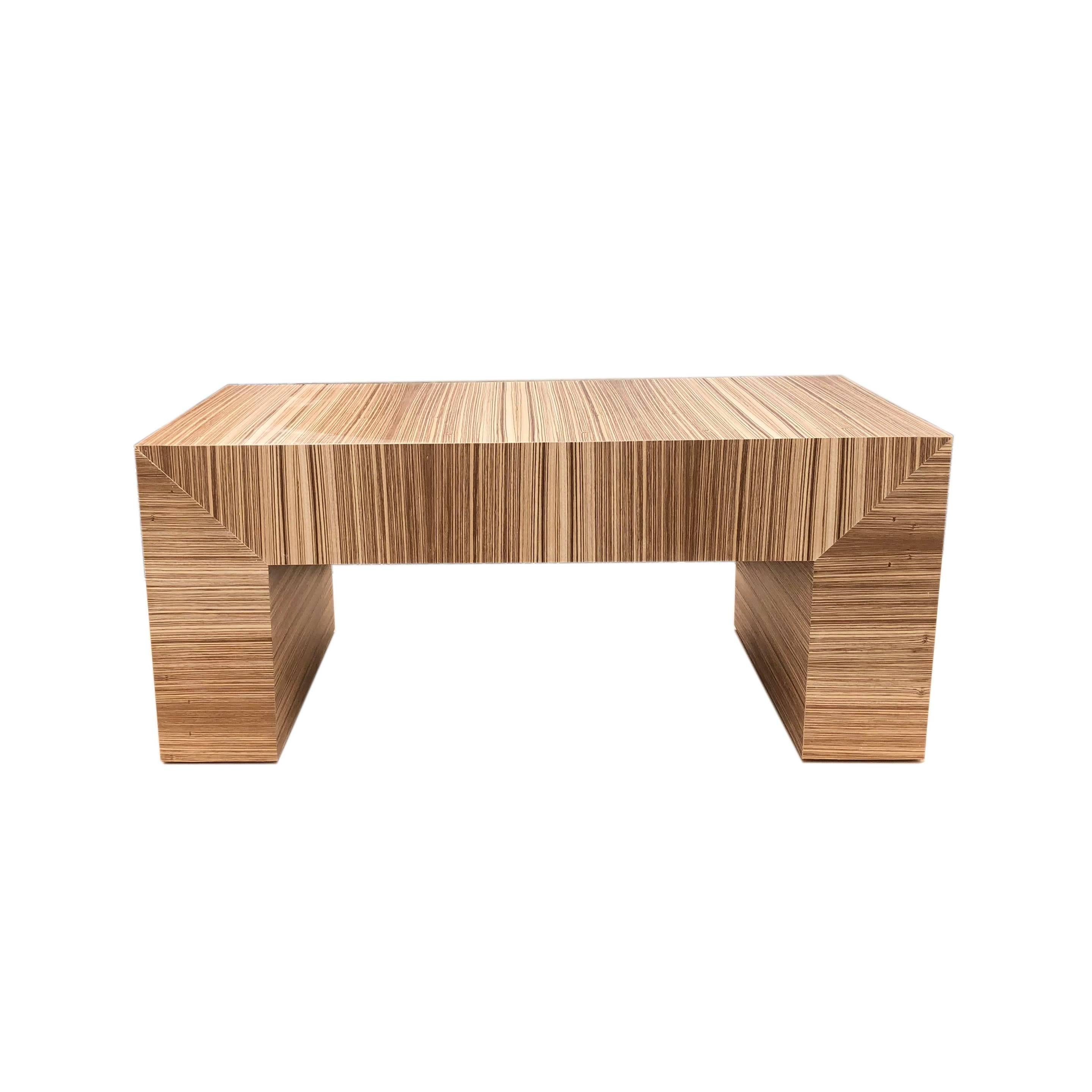 One of a kind, clean, sleek lined modern zebra wood coffee table. Constructed of the finest exotic veneer zebra wood. Also available in custom sizes.