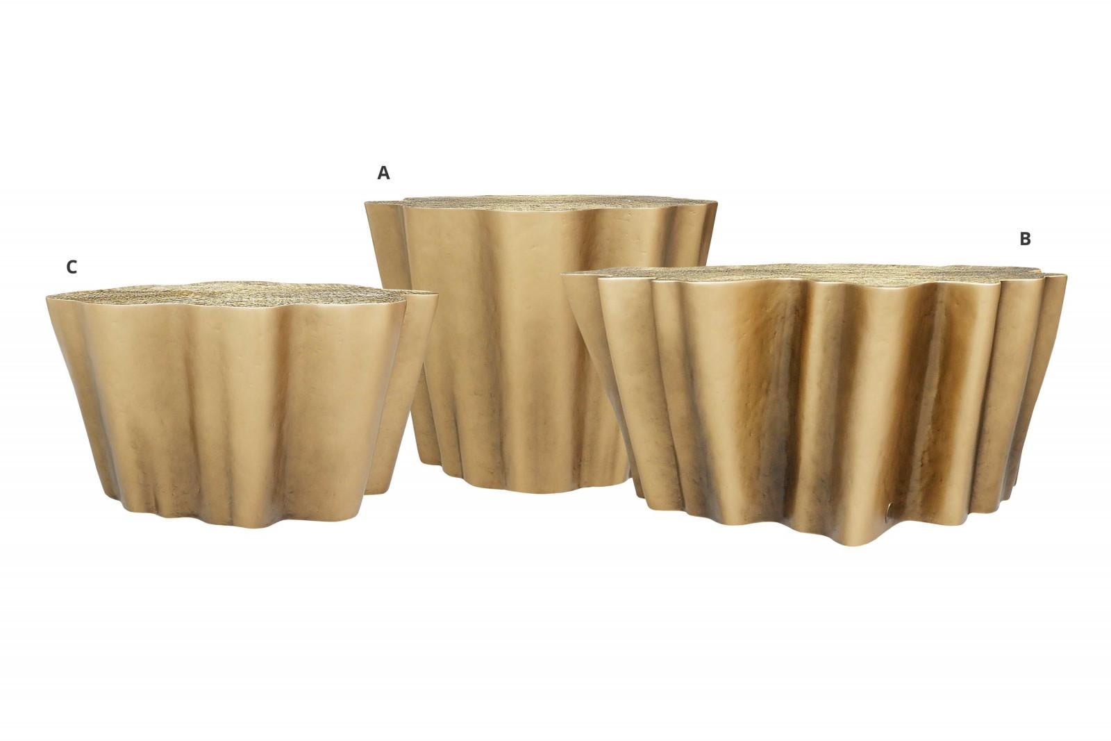This set of three contemporary low tables draws inspiration from the natural beauty of tree trunk cross-sections. Each table is uniquely crafted from resin, reinforced with fiberglass, and meticulously finished with a handmade silver leaf technique.