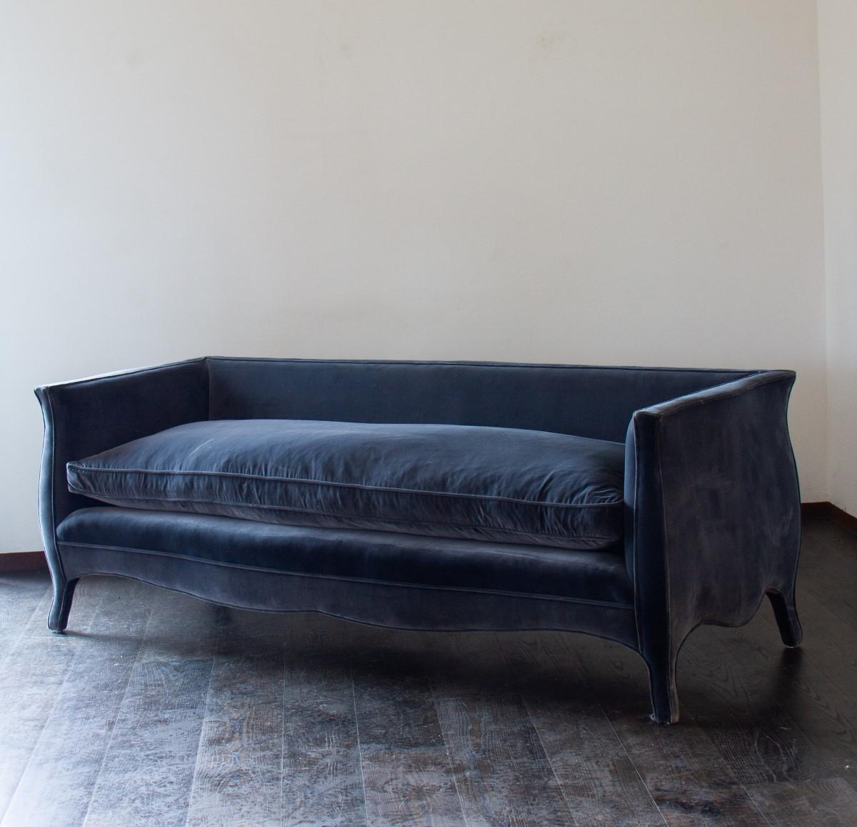A bespoke made, French style sofa, upholstered in a carbon blue colored velvet.

This sofa was designed by Ken Bolan and made in UK workshops. The design is based on a French style with sweeping curves and upholstered in a luxurious velvet. Made