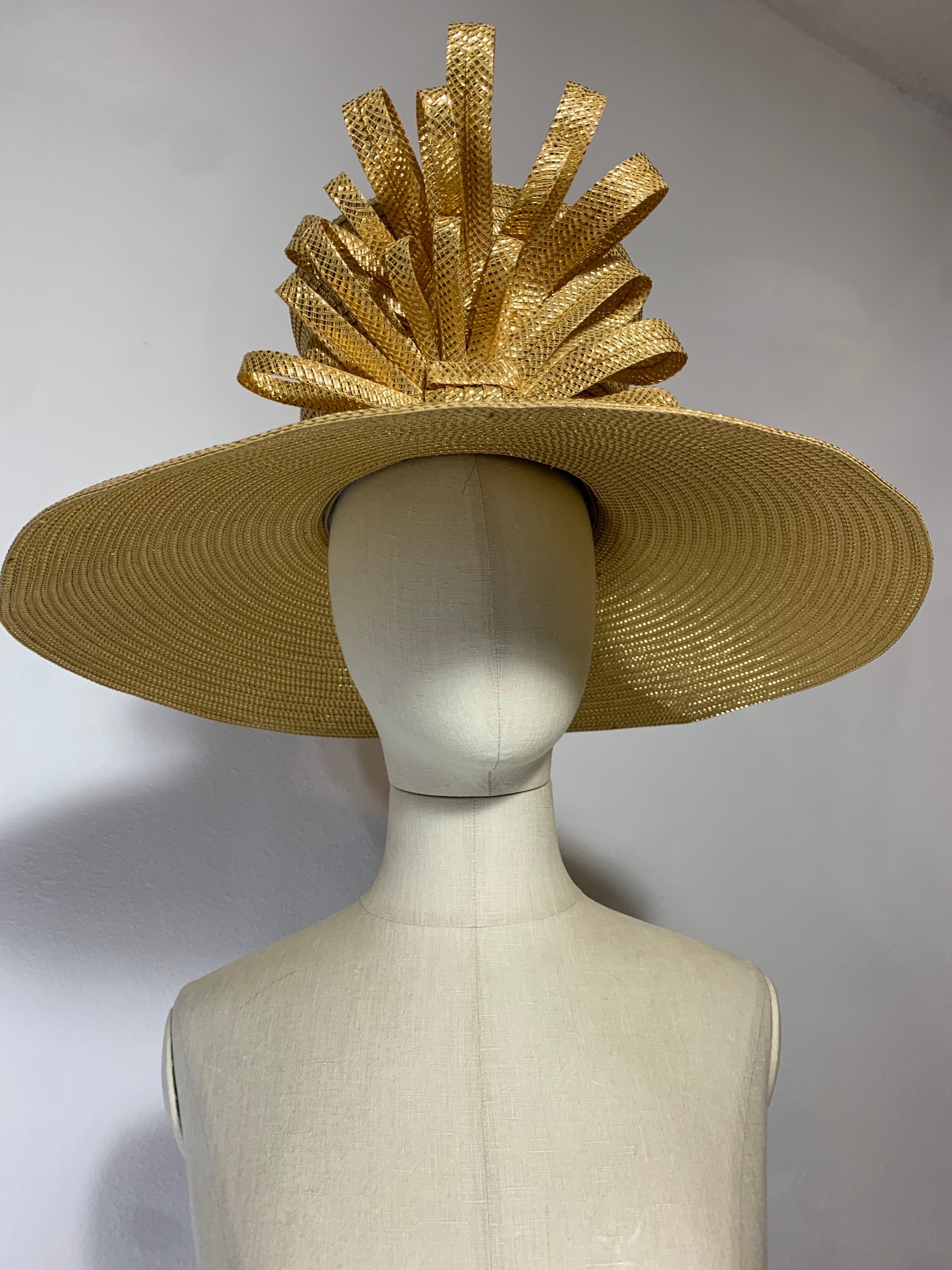 Custom Made Gleaming Gold Large Brimmed Straw Hat w High Crown & Straw Cockade:  Stunning bright gold lame colored straw hat with wide upturned brim, tall body, slightly rounded crown and looped straw cockade embellishment. Brim measures 21 1/2