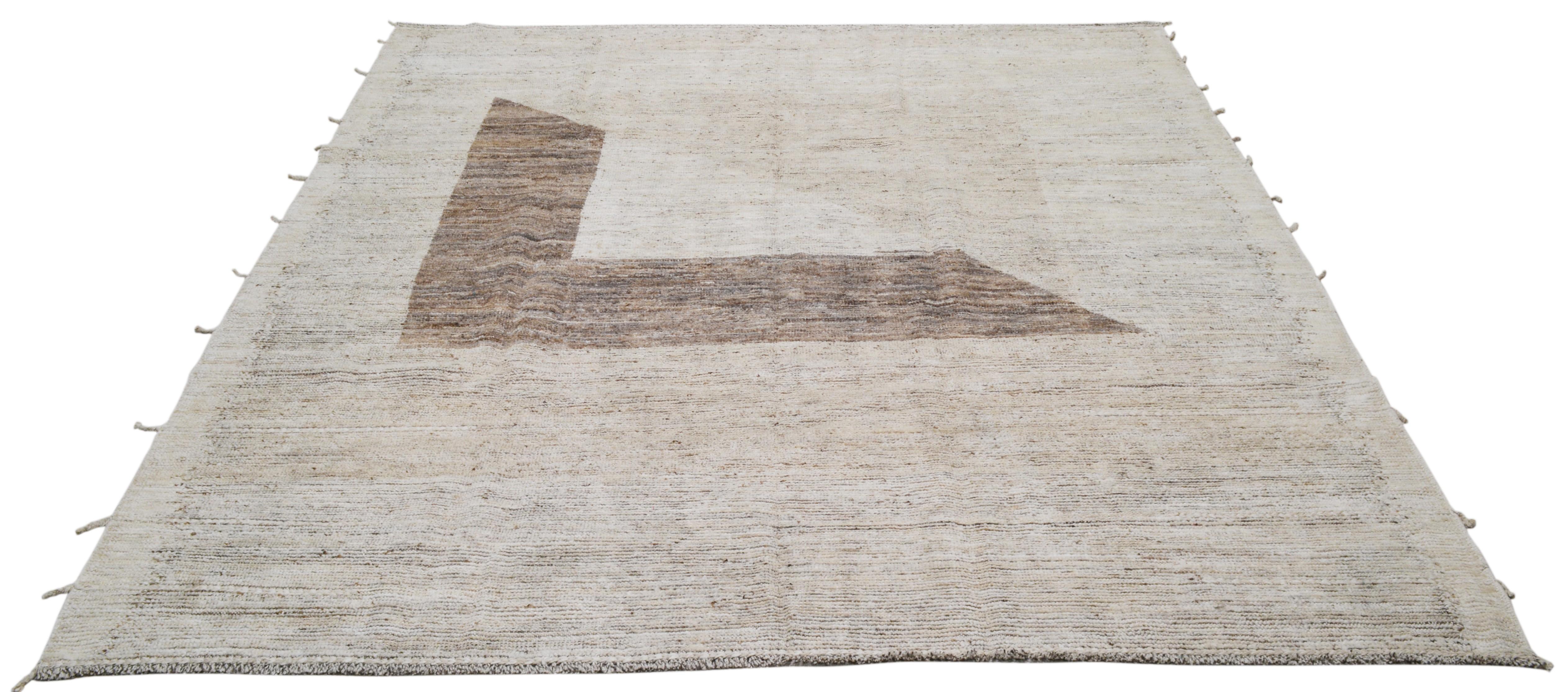 100% wool hand knotted / hand made Moroccan rug
Color: Sand, beige, brown, chocolate
Size: 8’5” x 9’6
Natural earthy colors look great with all styles, and will compliment any room.

