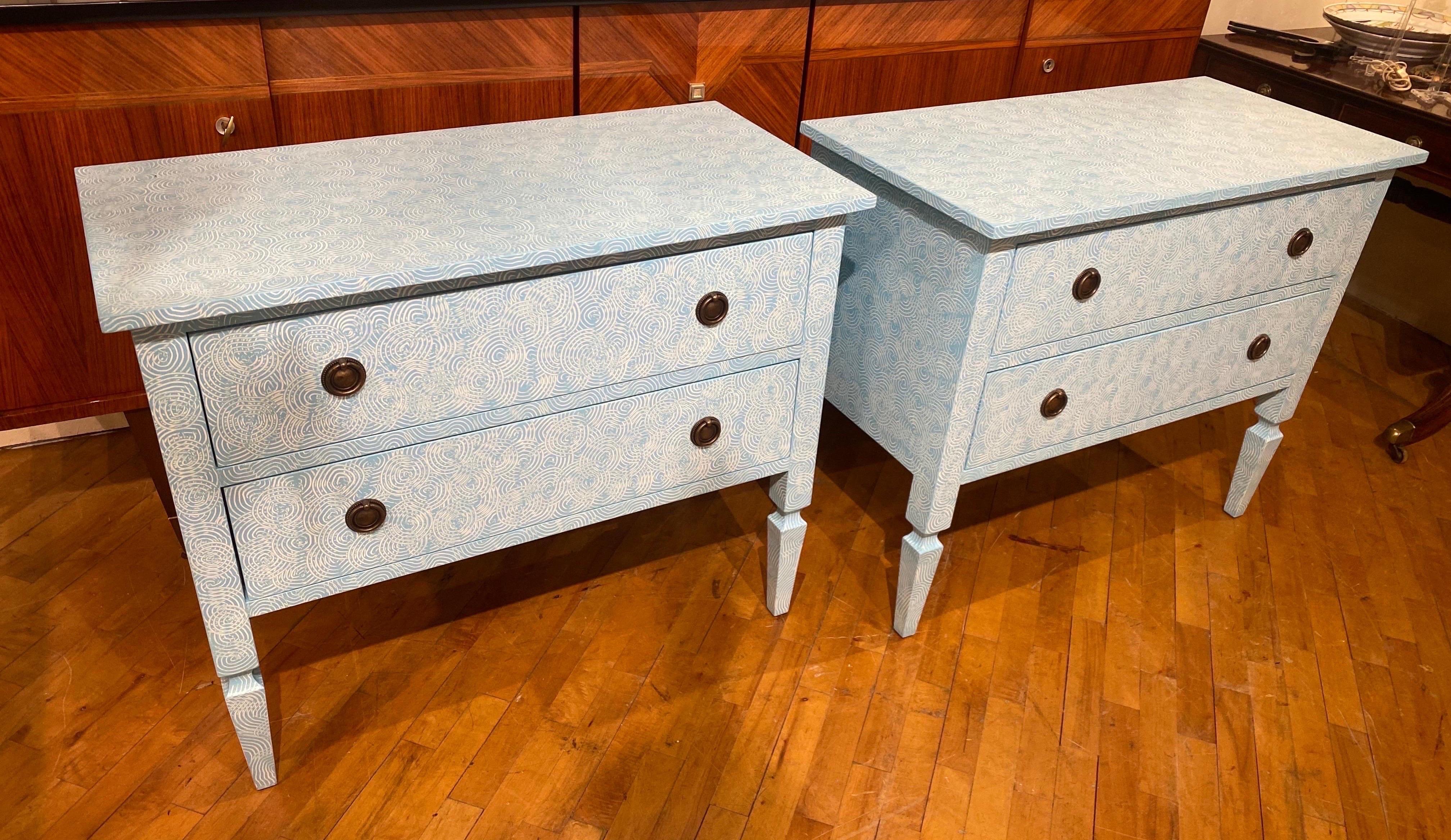 Stylish custom made hand painted bedside chest of drawers in blue textured swirls on tapered feet.

