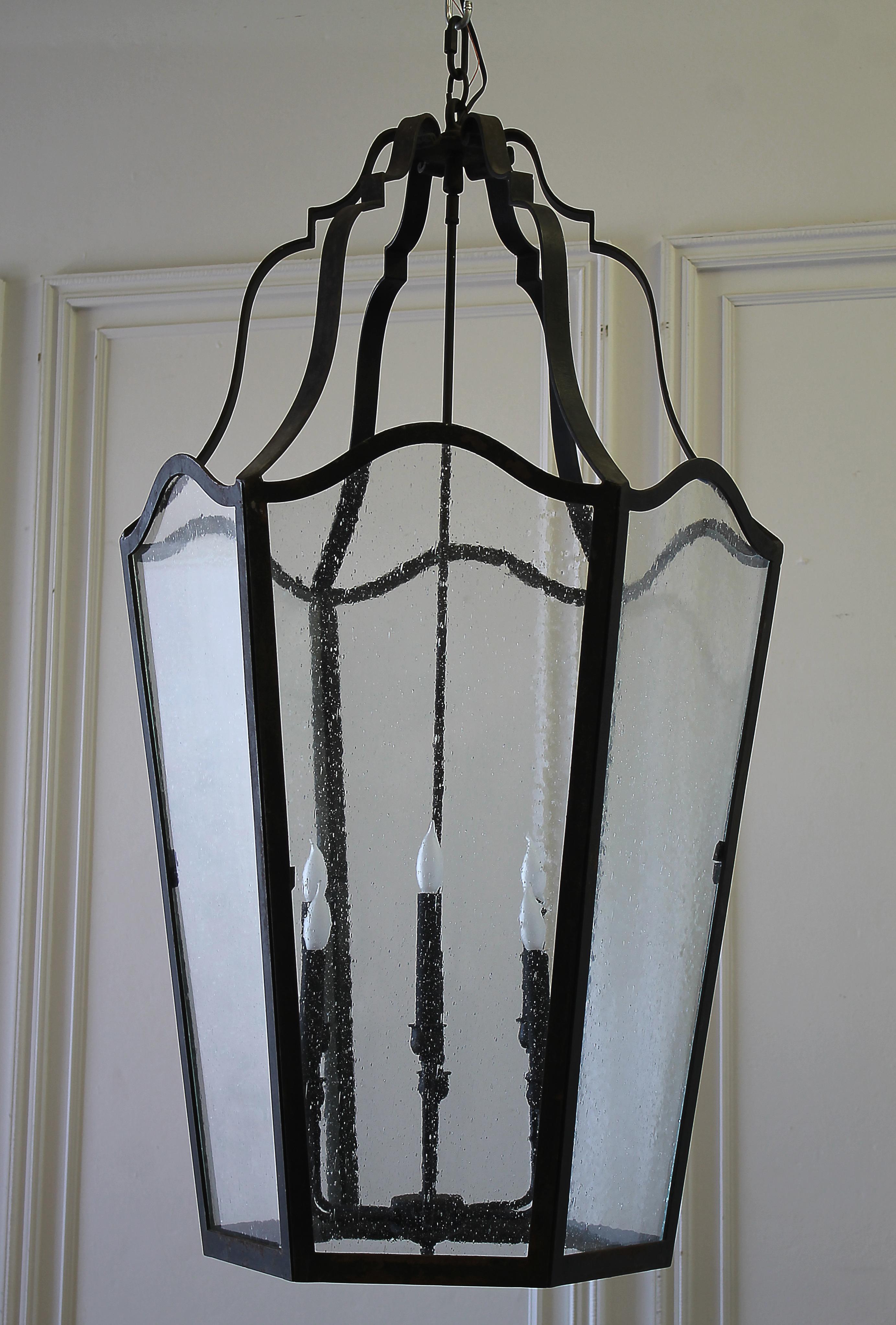 Custom-made iron lantern chandelier with seeded glass

Measures: 46