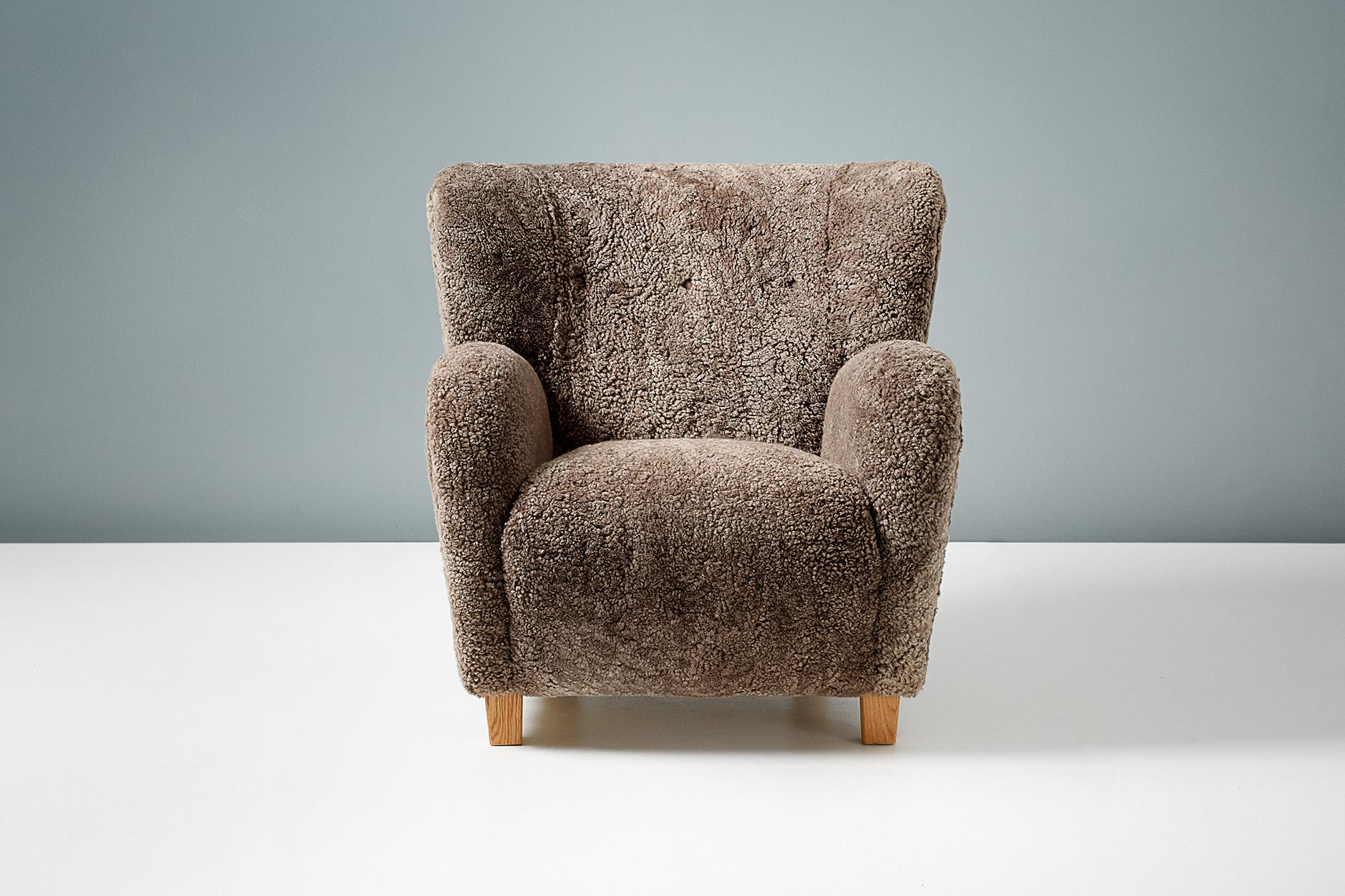Dagmar Design

KARU lounge chair & ottoman

A custom made lounge chair and ottoman developed and produced at our workshops in London using the highest quality materials. This example is upholstered in ‘Sahara’ brown Australian shearling and