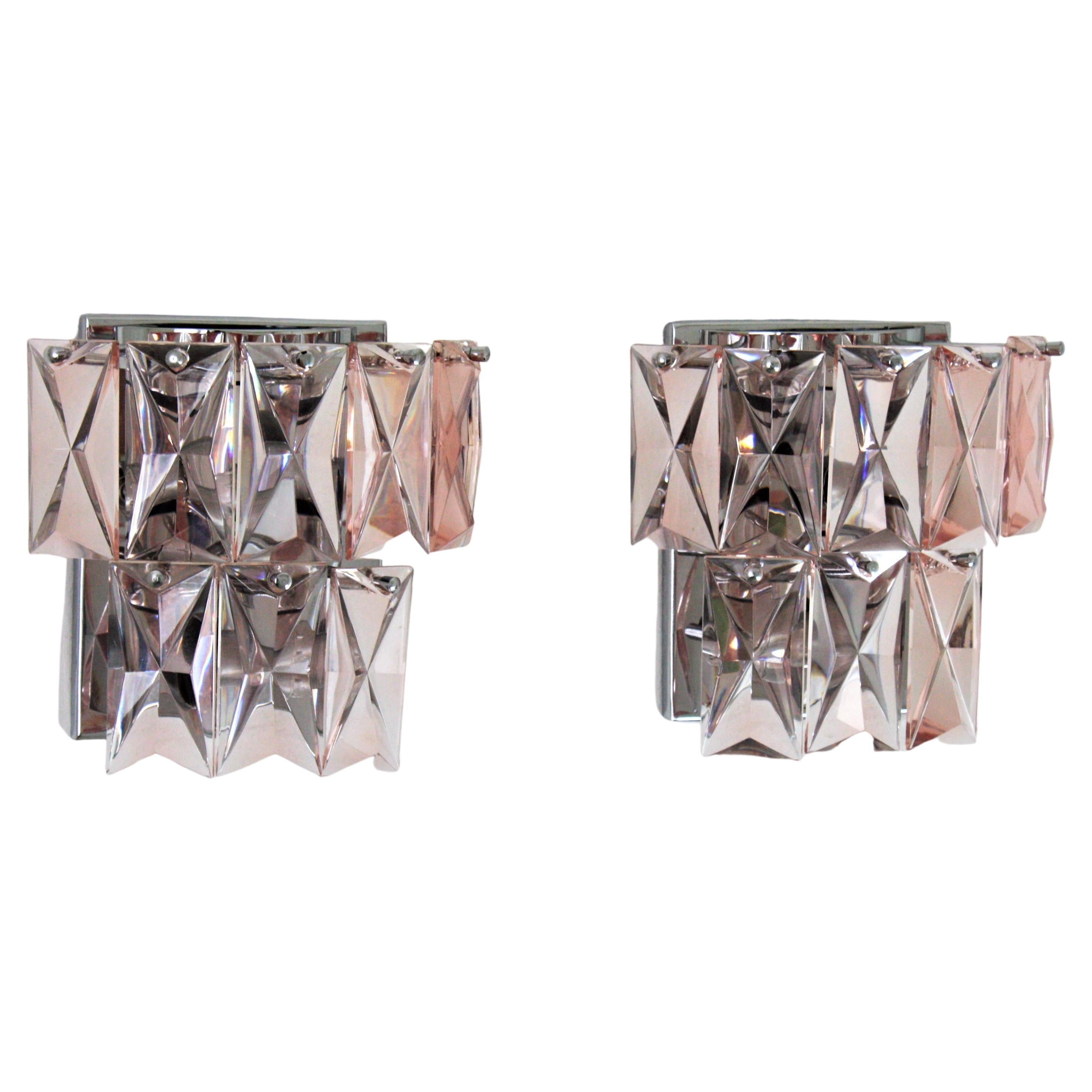 Pair of Mid-Century Modern French Baccarat style crystal wall lights in pink color.
A pair of Mid-Century Modern Baccarat style crystal wall sconces. Each one is made by 8 rectangular shaped PINK crystal pieces. All of them placed on a polished