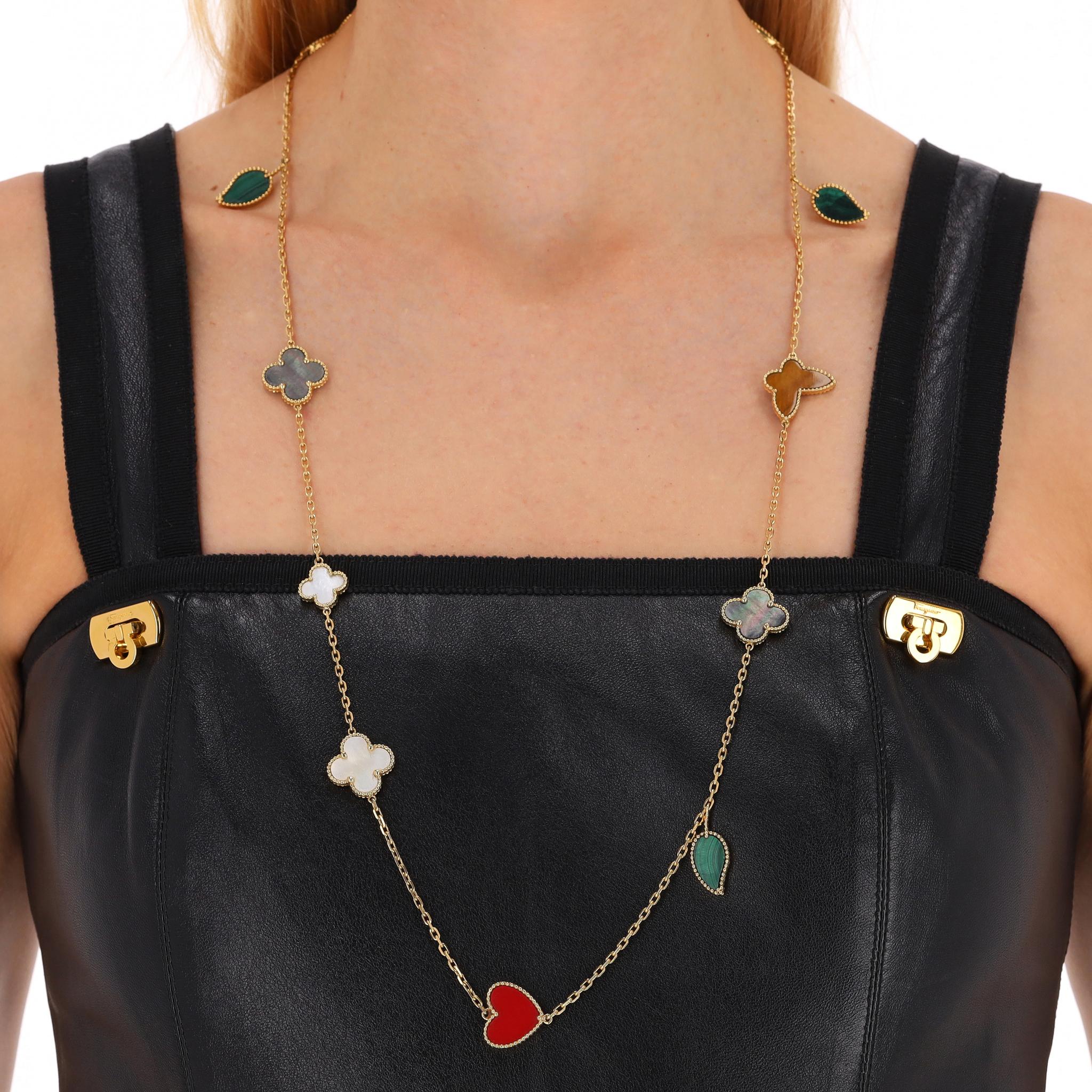 We Adore - Custom Made Lucky Alhambra Style 12 Motif Necklace in 18K Yellow Gold

This 18k yellow gold necklace features four beautifully crafted motifs framed in gold:

Deep red Carnelian Heart
Rich green Malachite Leaf
Luminous Mother-of-Pearl