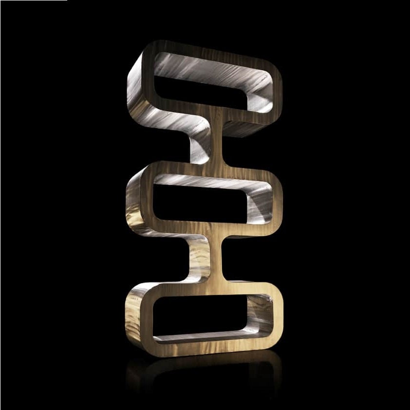 It is made of weldable aluminum sheet. It is completely hollow inside, so it is really light in comparison with the volume it has.
This shelving, alien totem of metallic profile  and sensual curves..
This pieces is made with aluminum
We will be glad