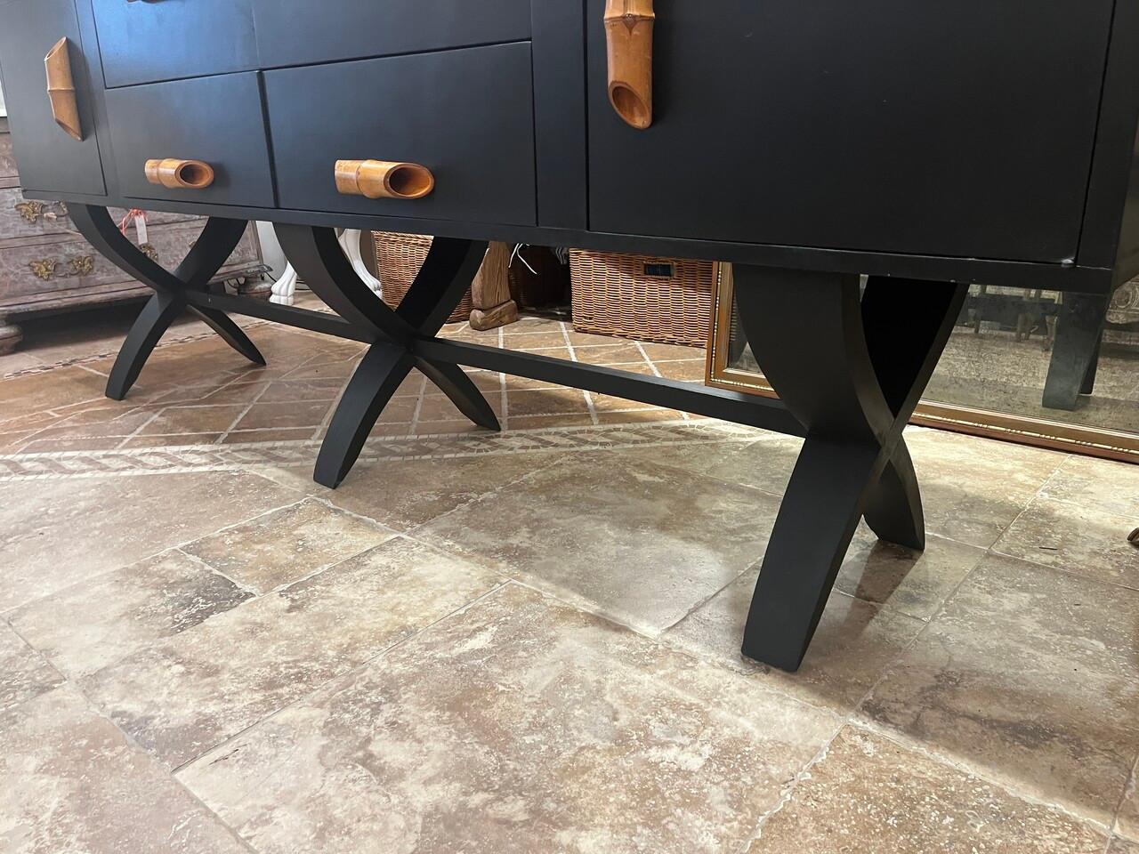 Custom-Made Mid-Century Style Credenza, one of a kind ebonized finish with unique bamboo pulls. Lots of storage.
Purchased at auction with scratches and was refinished.