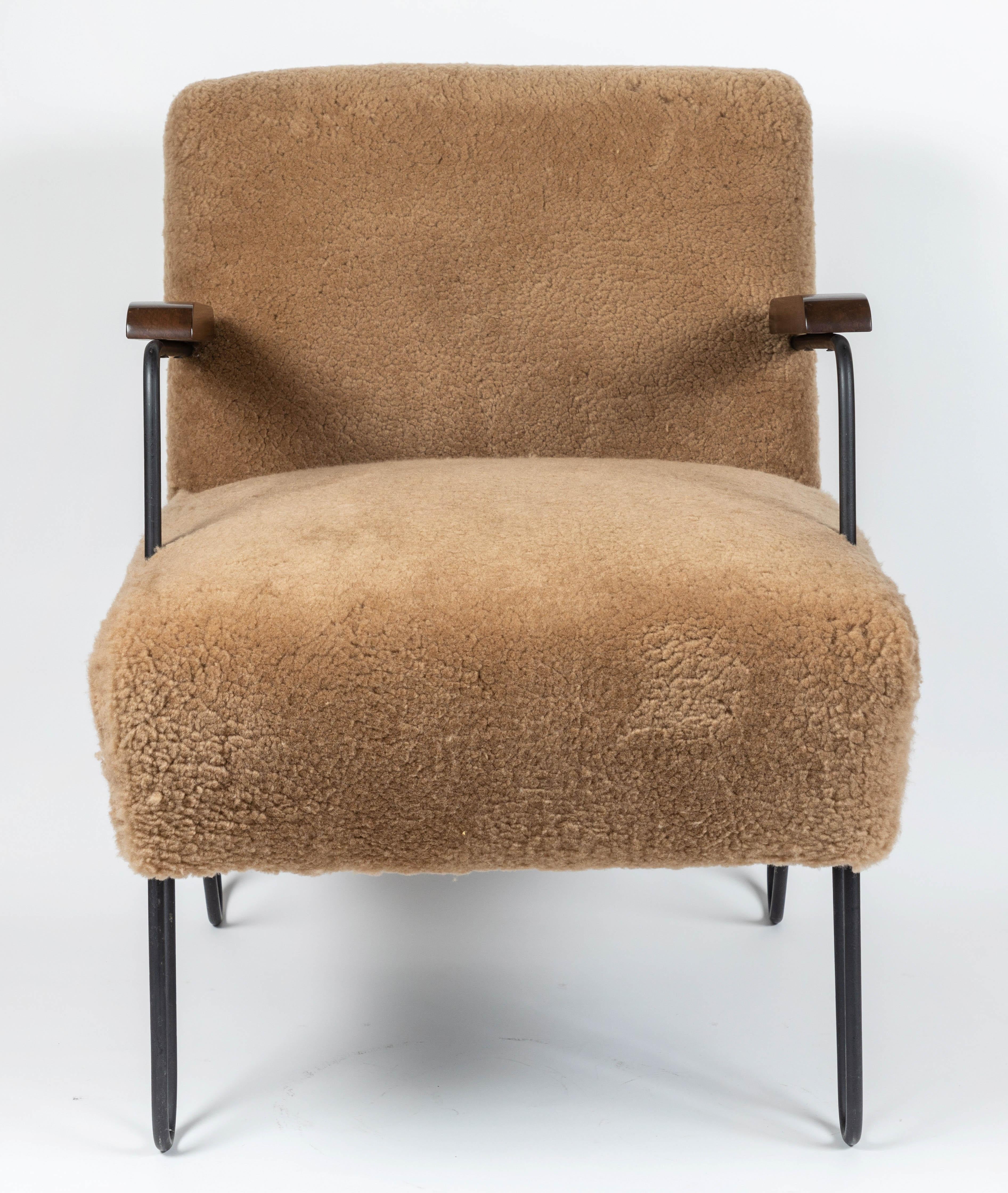 Custom made midcentury style hairpin chair with black iron frame, walnut armrests and upholstery as shown in caramel shearling.

Also available in white shearling, as shown in photos.

Lead time approximate 6 weeks.