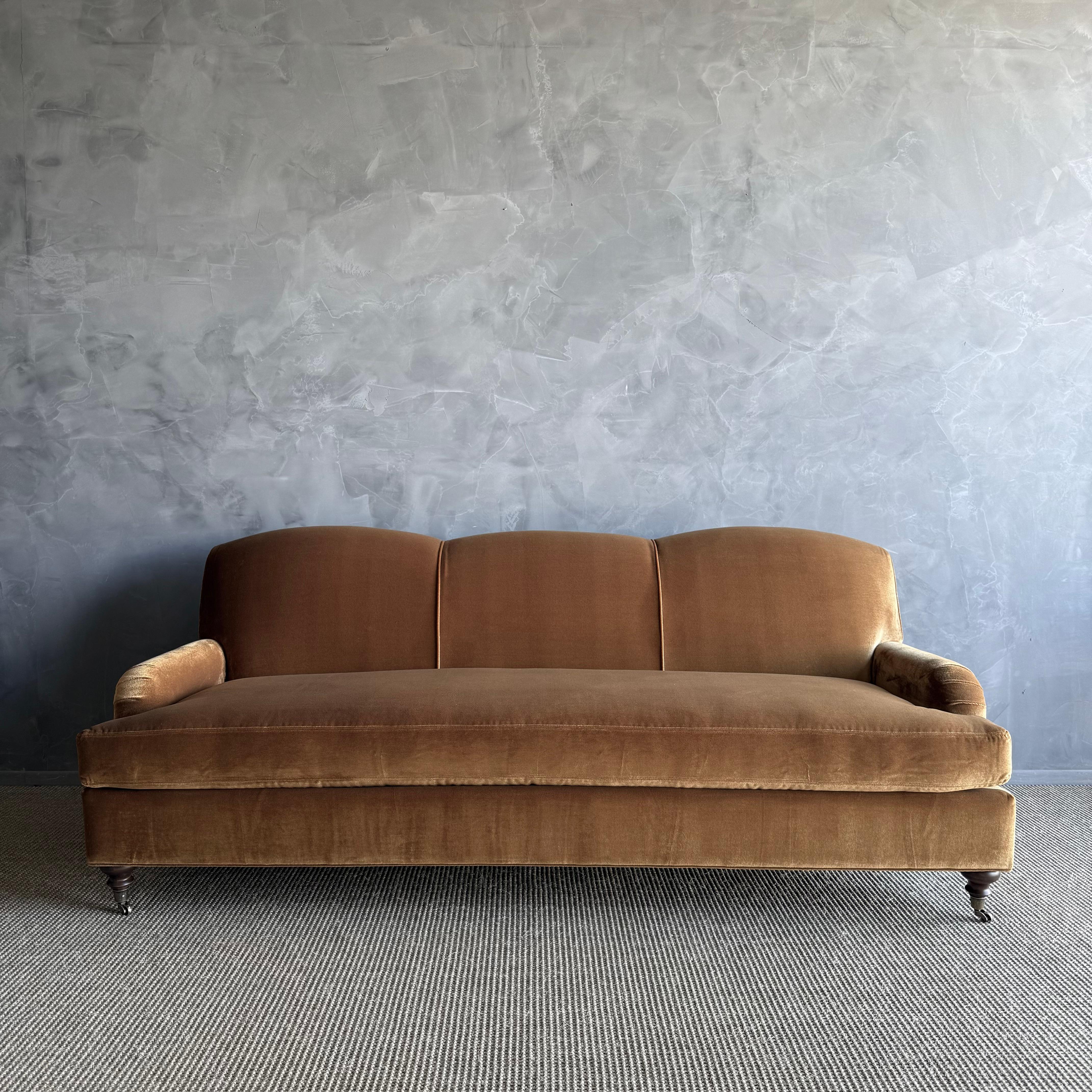 This beautiful english arm sofa has a modern twist, with its single bench cushion, and beautiful curved apron sides. It’s upholstered in a Linen Velvet Performance  fabric. 
Shown in HENNA (dark rust / brown)
also shown in PUTTY (CREM/BEIGE