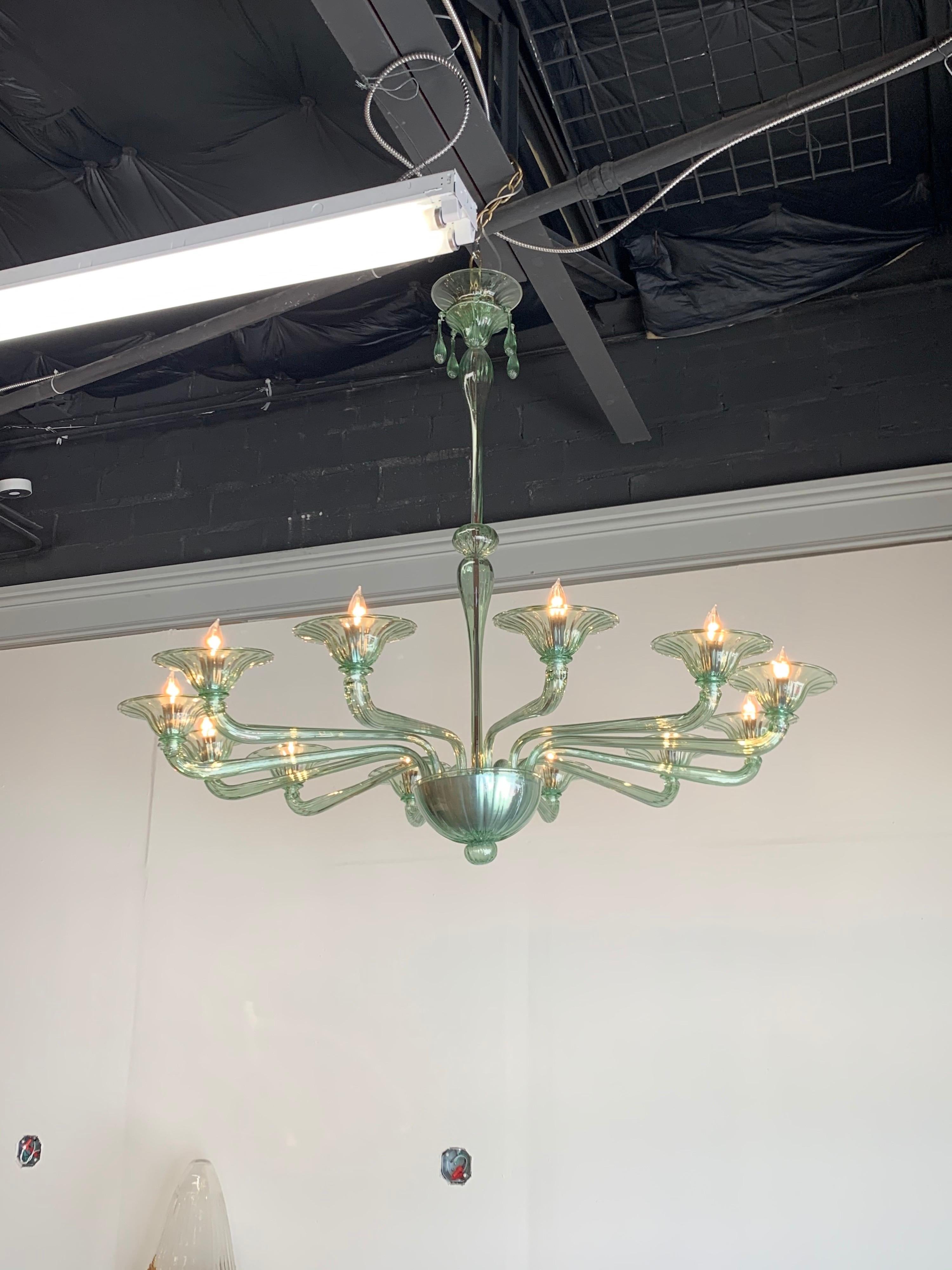 Amazing custom made Murano glass chandelier in a shade of pale green. Fabulous for modern decor and can be made in any color. A Legacy exclusive!