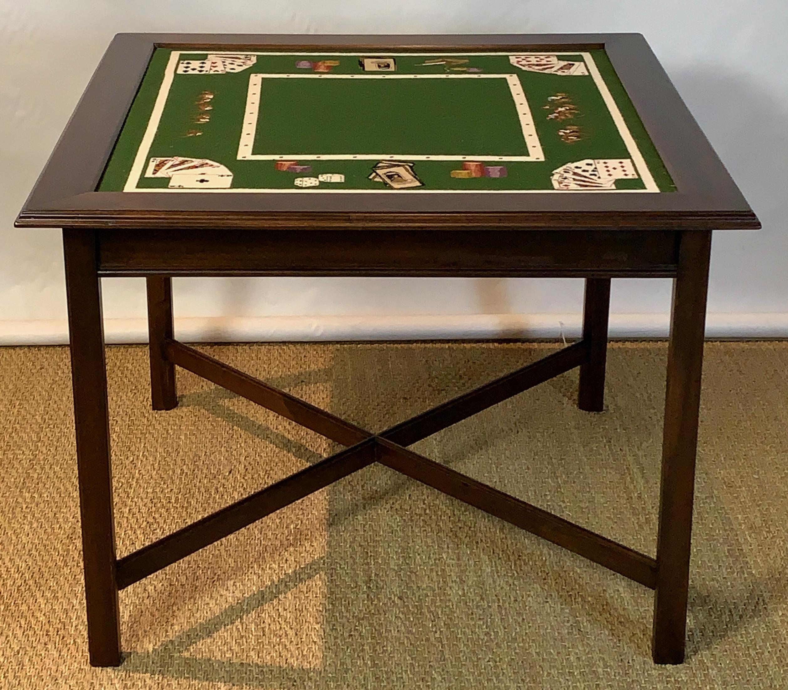 A custom made mahogany games table inset with mid-20th century needlepoint top decorated with playing cards, poker chips and race horses.
