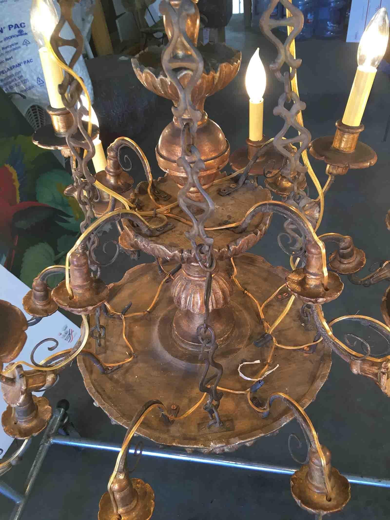 American Custom Made Neo-Classic English 12 Arm Wood and Iron Chandelier For Sale