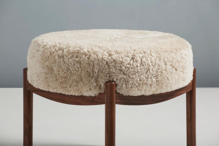 British Custom Made Walnut and Shearling Round Ottoman For Sale