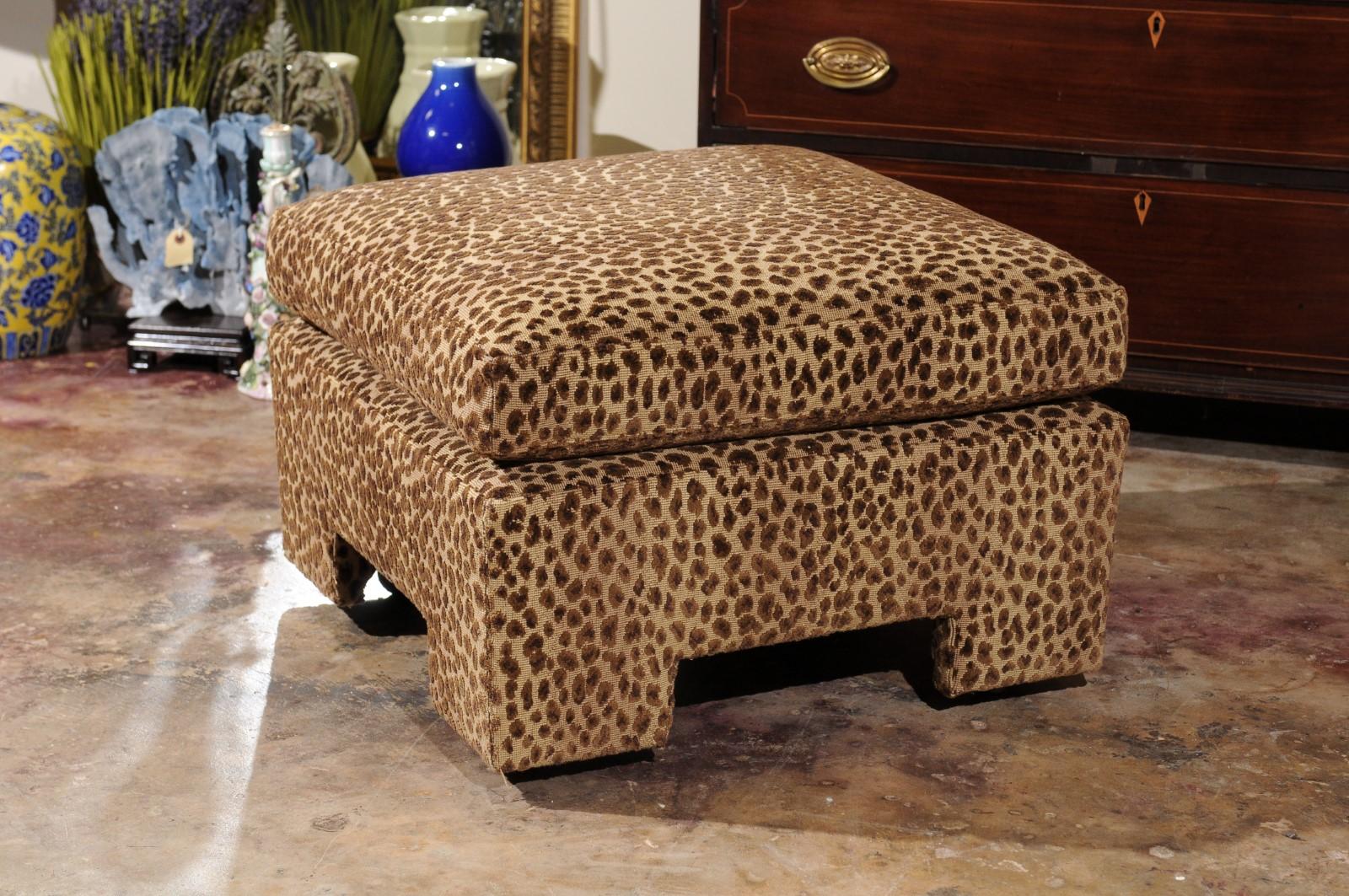 A lovely custom made ottoman on casters.
Upholstered in a Lee Jofa animal print.