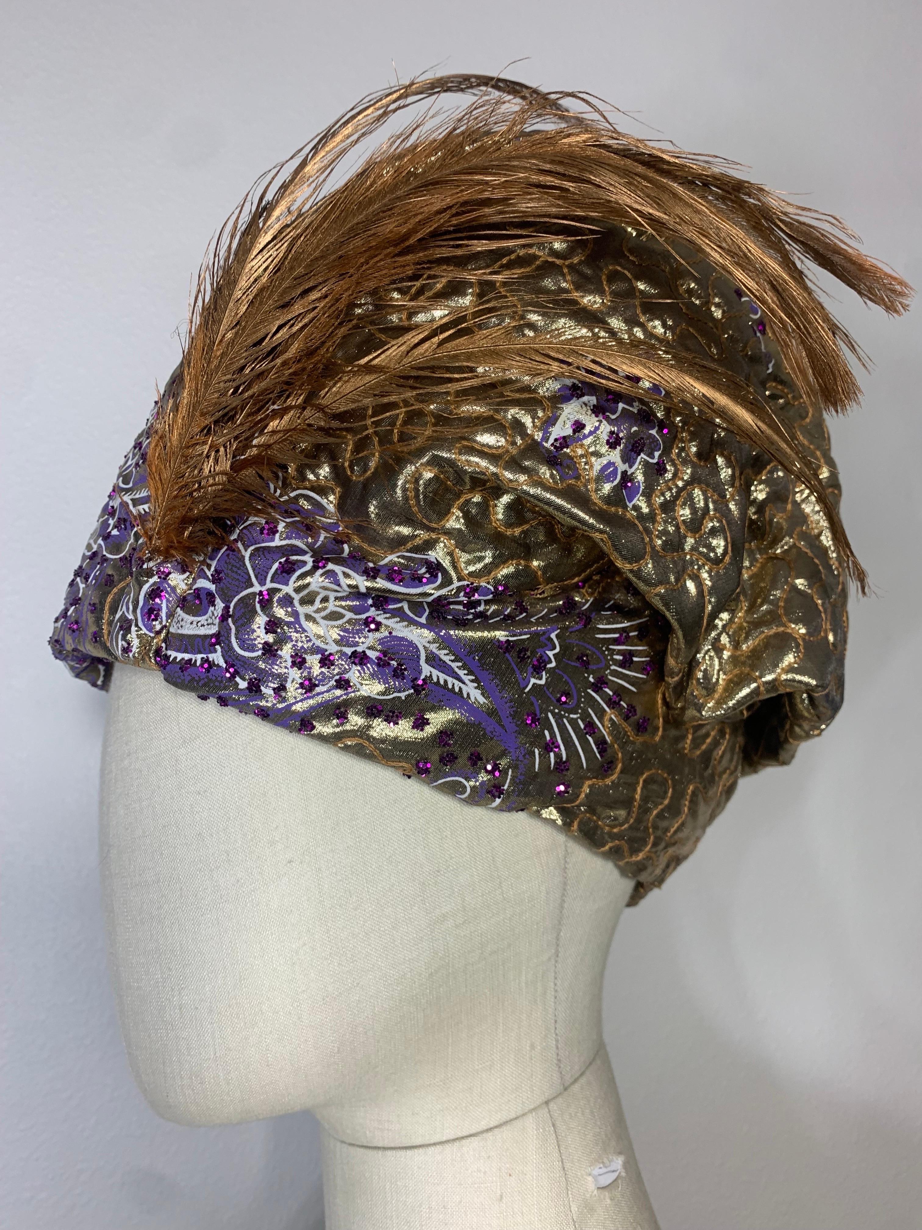 Custom-Made Purple & Gold Lame Matelassé Quilted Turban w Gold Painted Feathers:  Suzanne Couture Millinery Turban, unstructured incorporating a folding design. Fully lined with gold lame. Soft and easy to wear. Couture quality fabric with amethyst