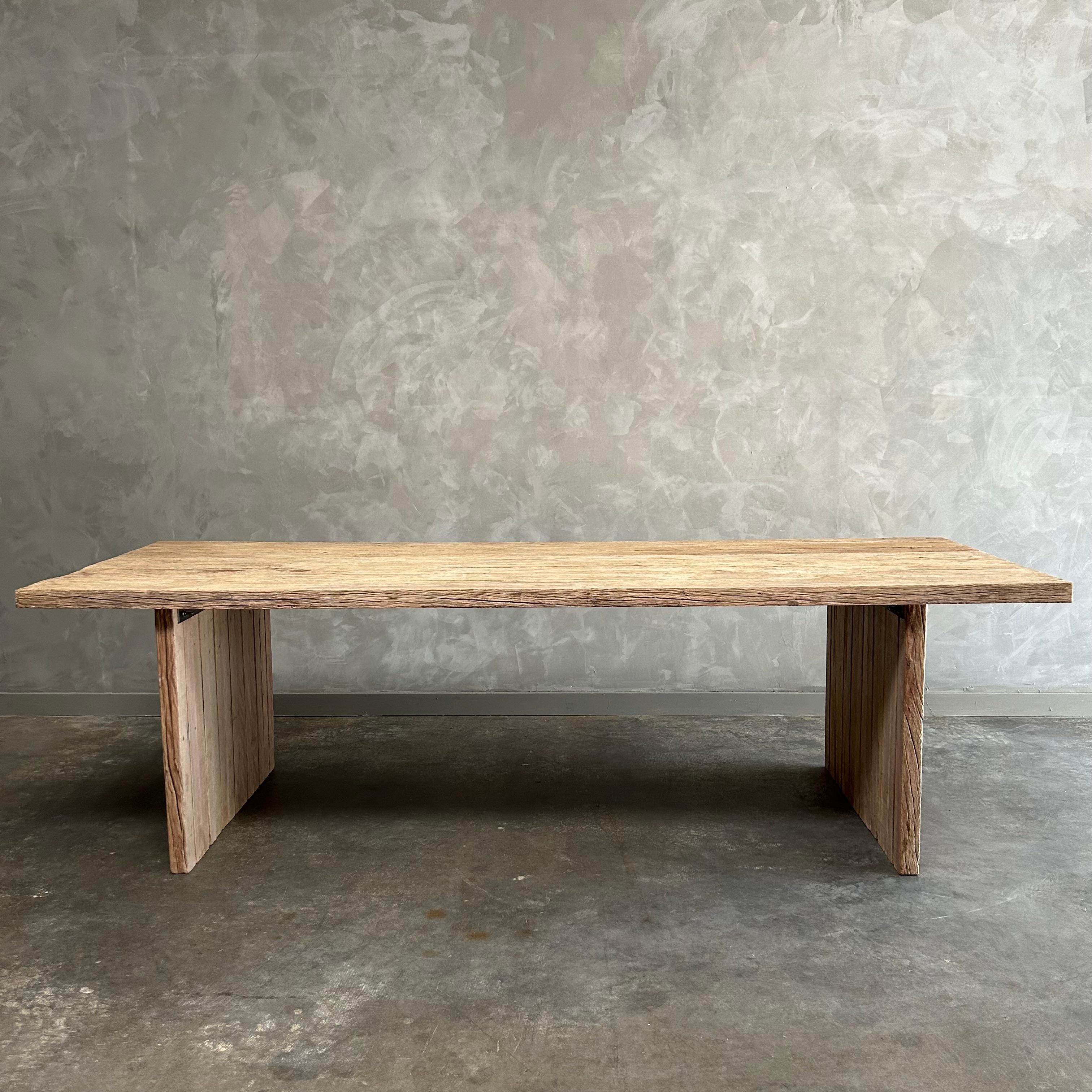 Elm dining table 
Size: 86”W x 38”D x 30”H
Custom made, beautiful solid elm wood top, with natural characteristics, and double pedestal base. Top is removable from base(s).
Seats 6 comfortably.
Solid and sturdy, ready for everyday use.
 