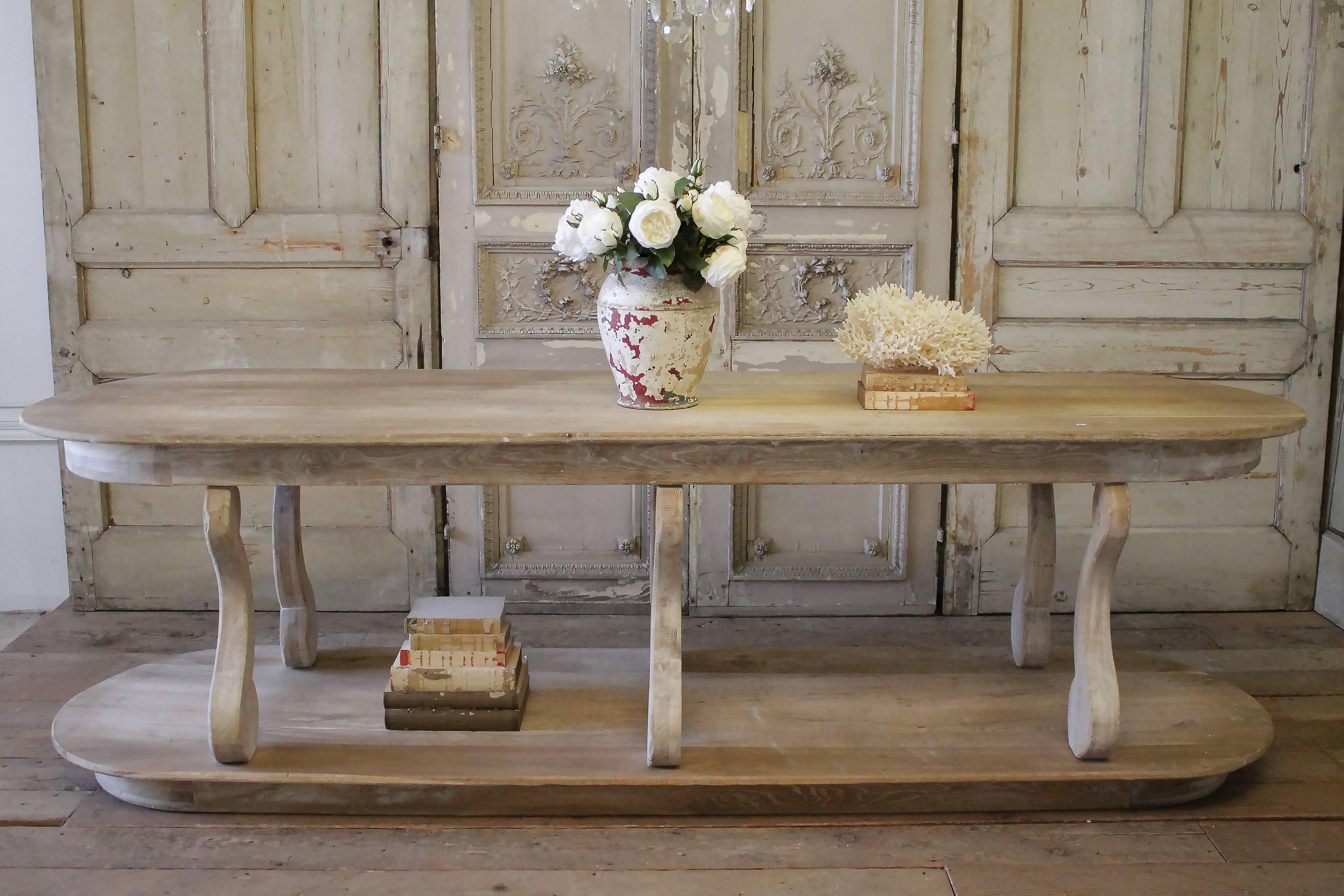 Custom made reclaimed wood console table with 6 corbel style legs. These legs have a bolt in system, which can be removed to disassemble, making the table easier to get into your space.
Measures: 99” L x 26.5