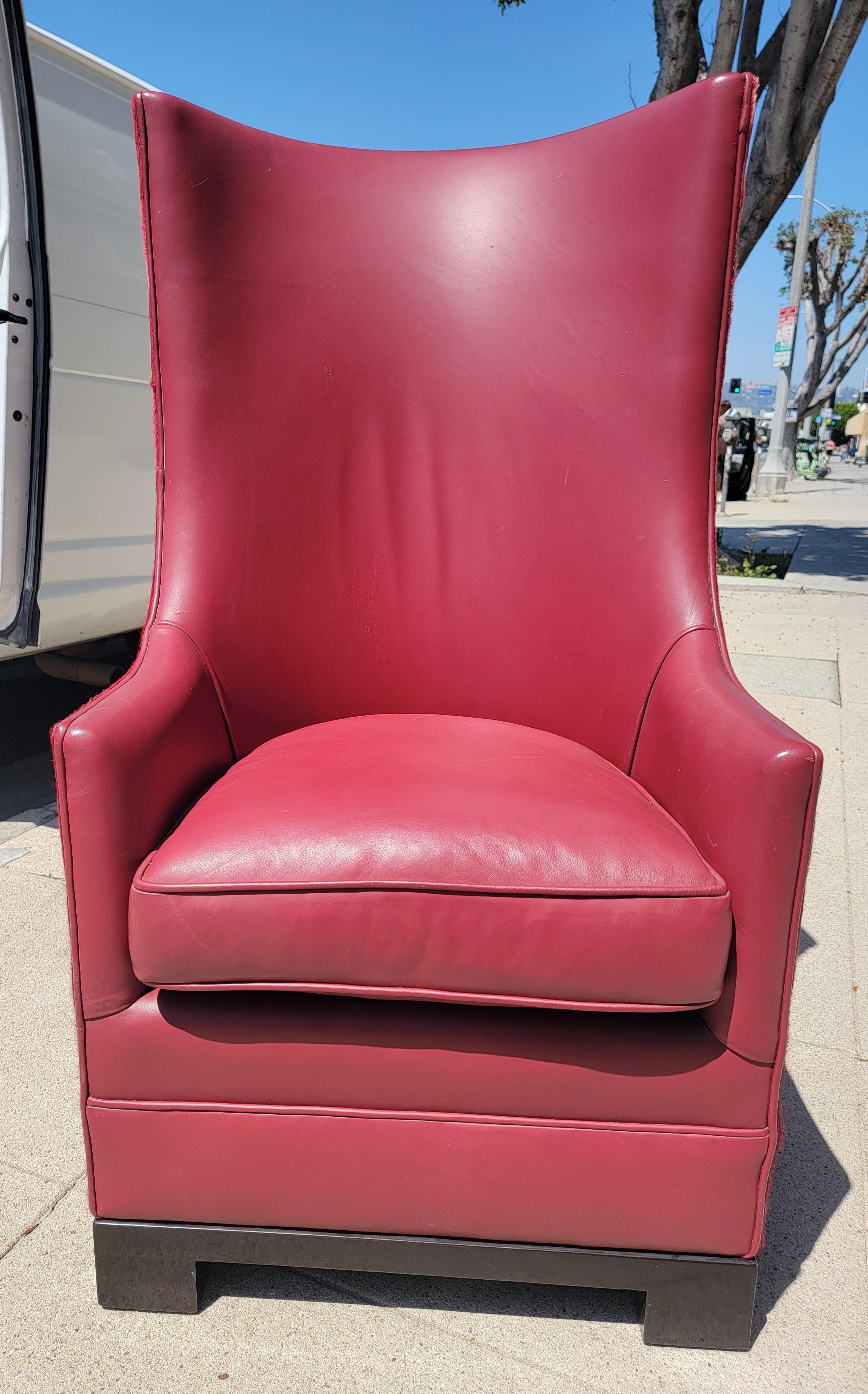 20Thc Mid century custom made red leather chair with died  red cow skin backing. This is a custom made leather chair.
