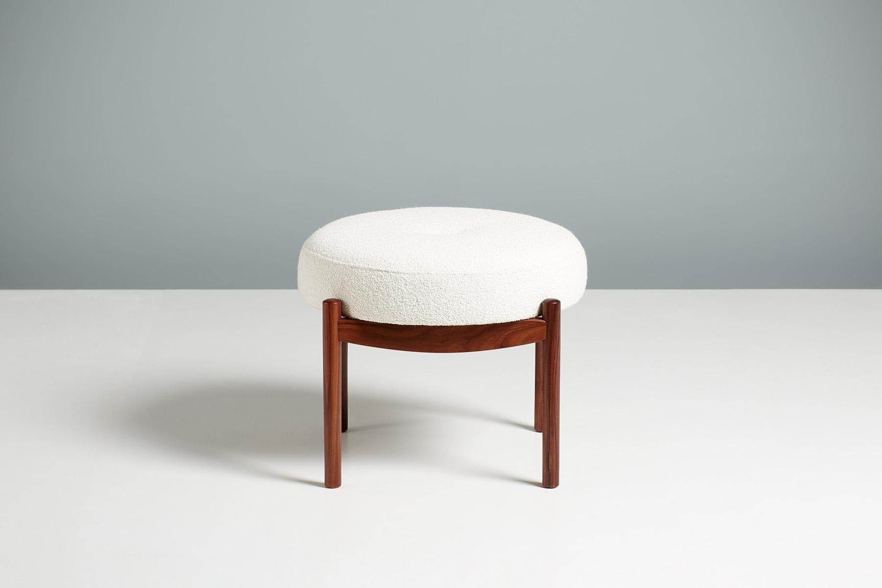 Custom Made Esko Ottoman from Dagmar Design

A custom-made round ottoman with luxurious Santos rosewood frames developed & produced at Dagmar's workshops in London. This example has a seat upholstered in off-white boucle fabric from Chase Erwin.