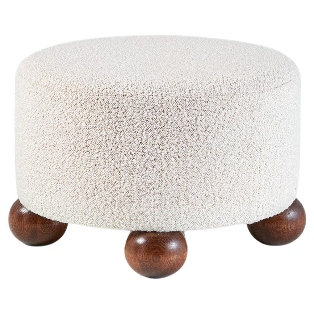 Custom Made Round Ottoman with Oak Ball Feet. Available in COM
