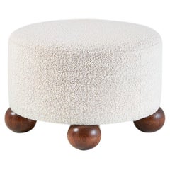 Custom Made Round Ottoman with Oak Ball Feet. Available in COM