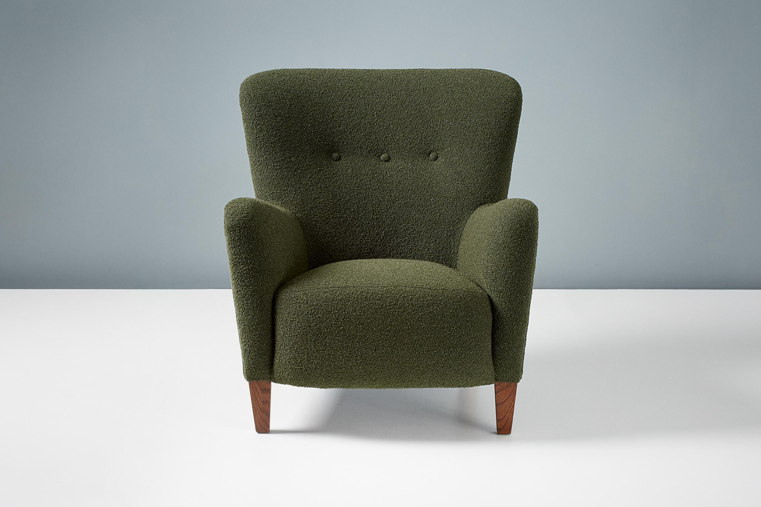 Dagmar design

RYO armchair

A custom made lounge chair developed and produced at our workshops in London using the highest quality materials. This example are upholstered in luxurious Chase Erwin boucle green fabric and features fumed oak legs.
