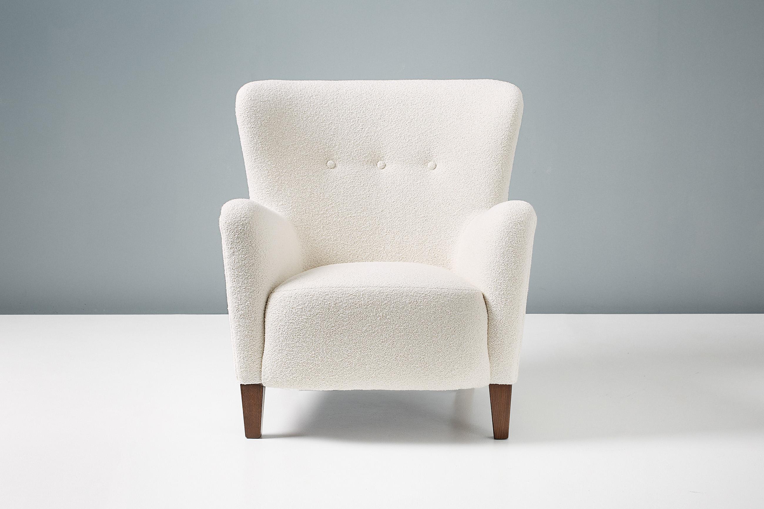 Dagmar design

RYO armchair

Custom made lounge chair developed and produced at our workshops in London using the highest quality materials. This example is upholstered in a luxurious cotton-wool blend off-white bouclé fabric and features stained